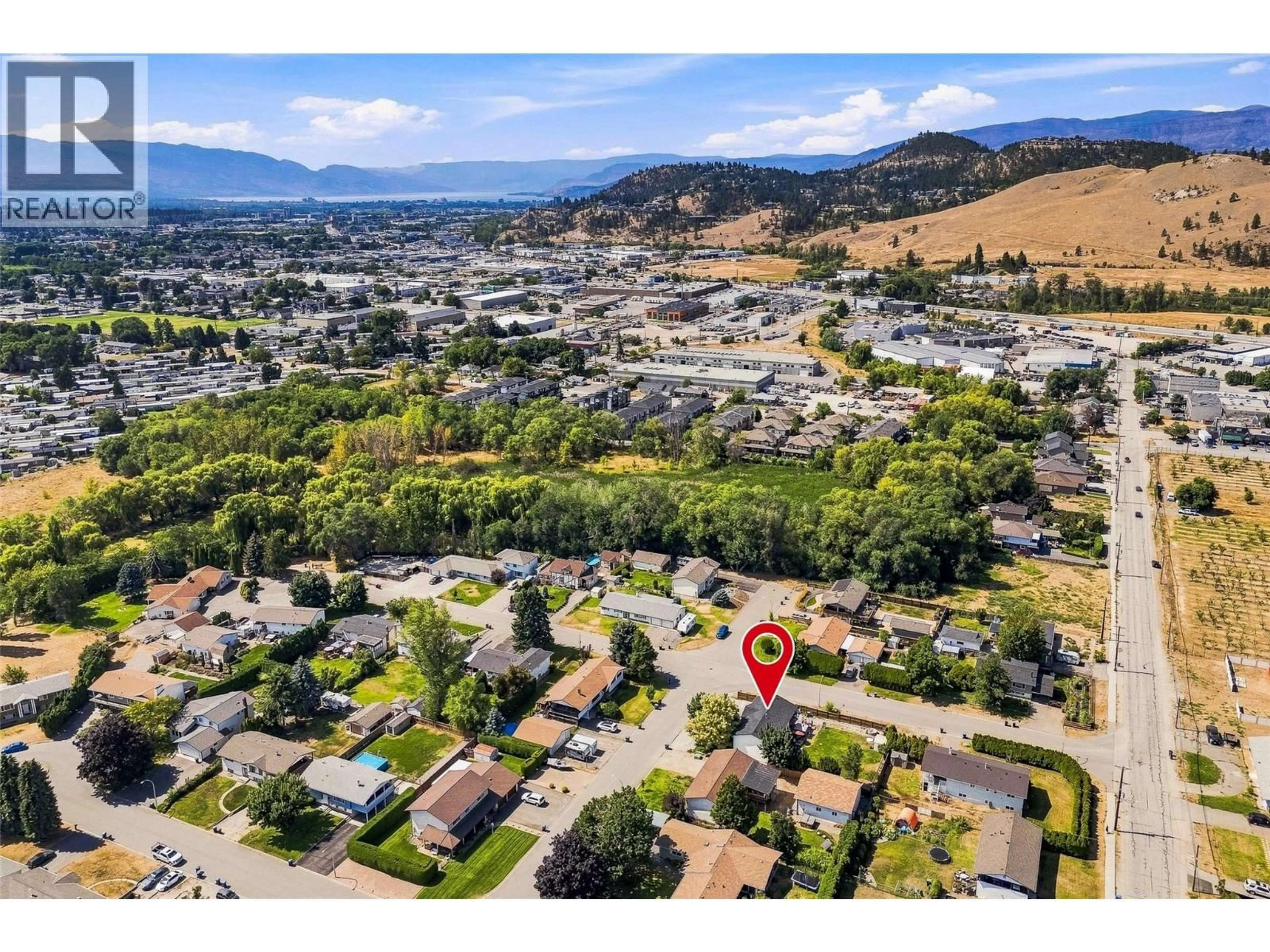 A pic from outside/outdoor area/front of a property/back of a property/a pic from drone, mountain view for 420 HILLABY AVENUE, Kelowna British Columbia V1X6G2