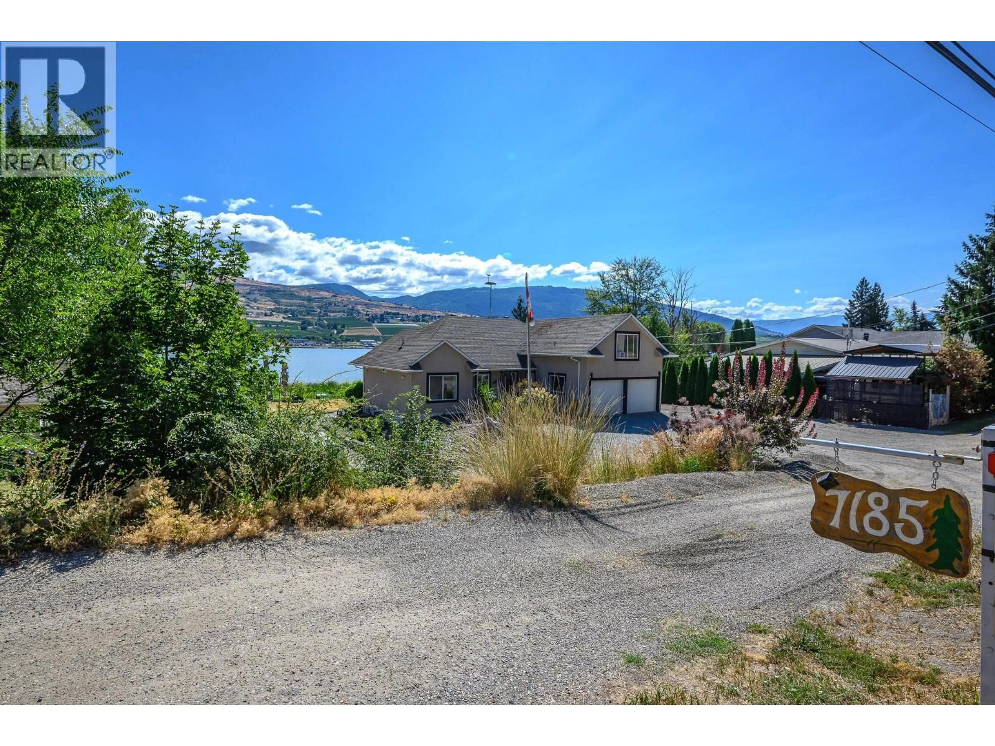 A pic from outside/outdoor area/front of a property/back of a property/a pic from drone, water/lake/river/ocean view for 7185 OLD KAMLOOPS ROAD, Vernon British Columbia V1H1W6