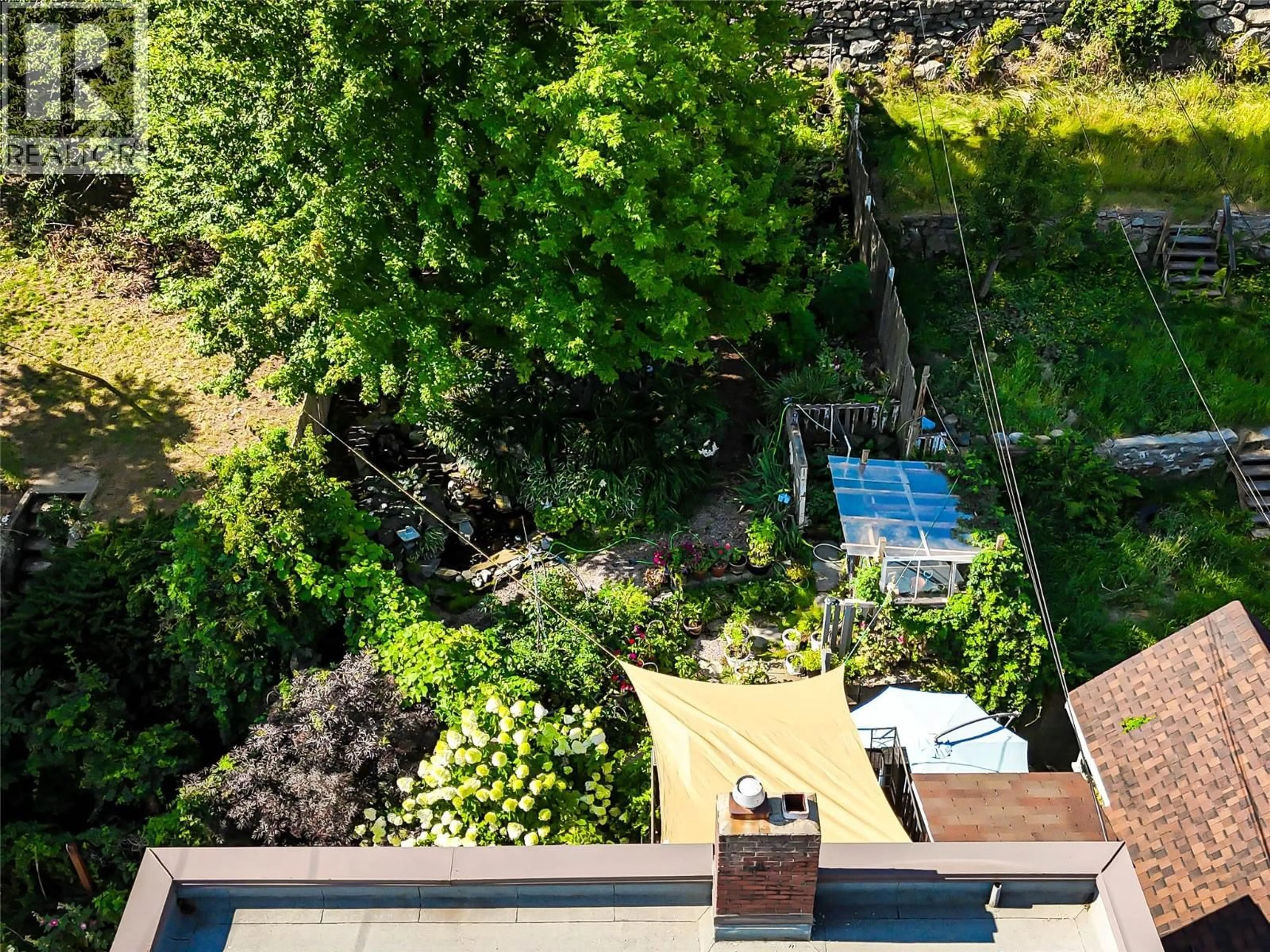 A pic from outside/outdoor area/front of a property/back of a property/a pic from drone, city buildings view from balcony for 962 NELSON AVENUE, Trail British Columbia V1R3H2