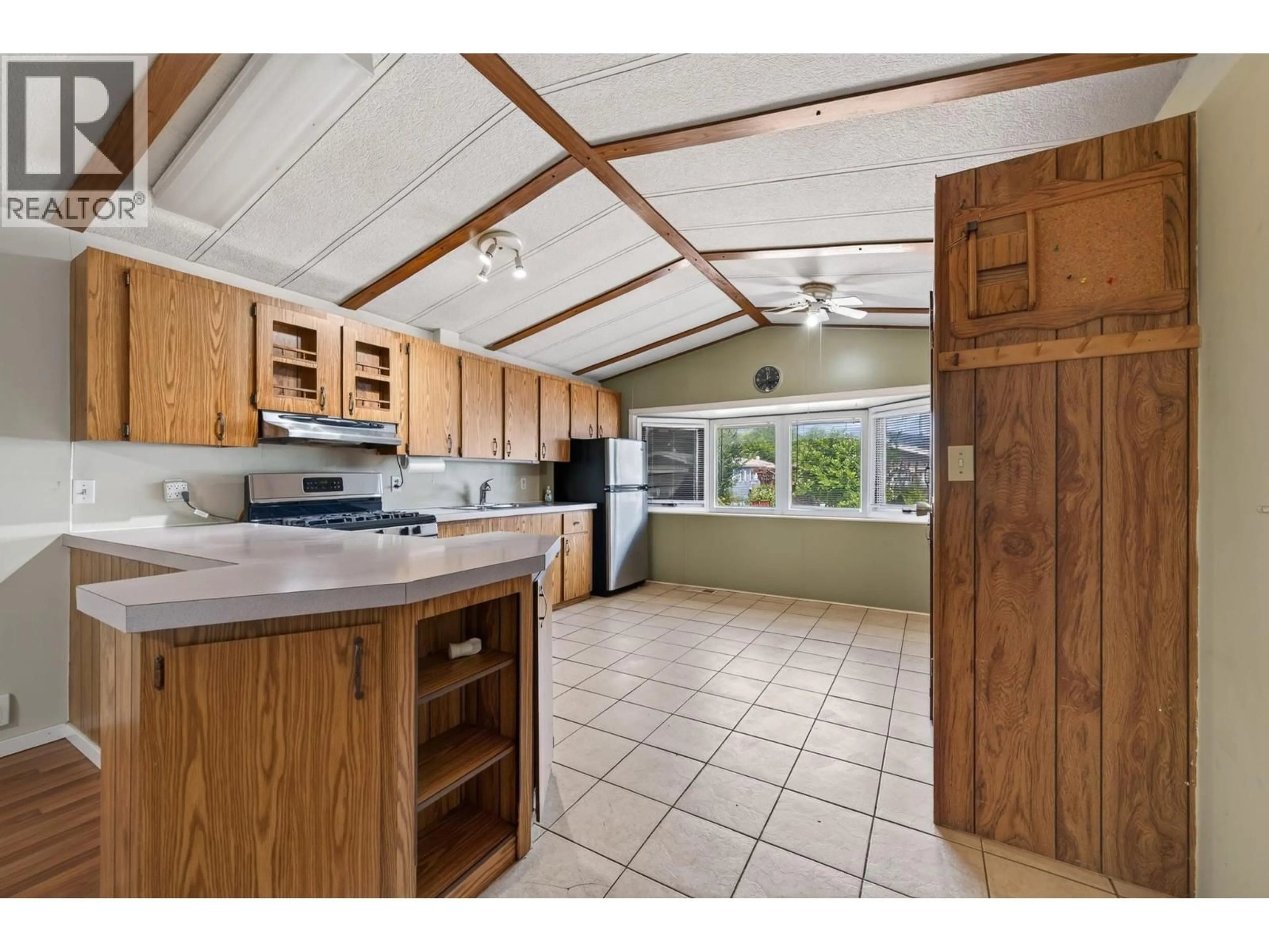 Standard kitchen, ceramic/tile floor for 5280 69 AVENUE NORTHEAST, Salmon Arm British Columbia V0E1K0