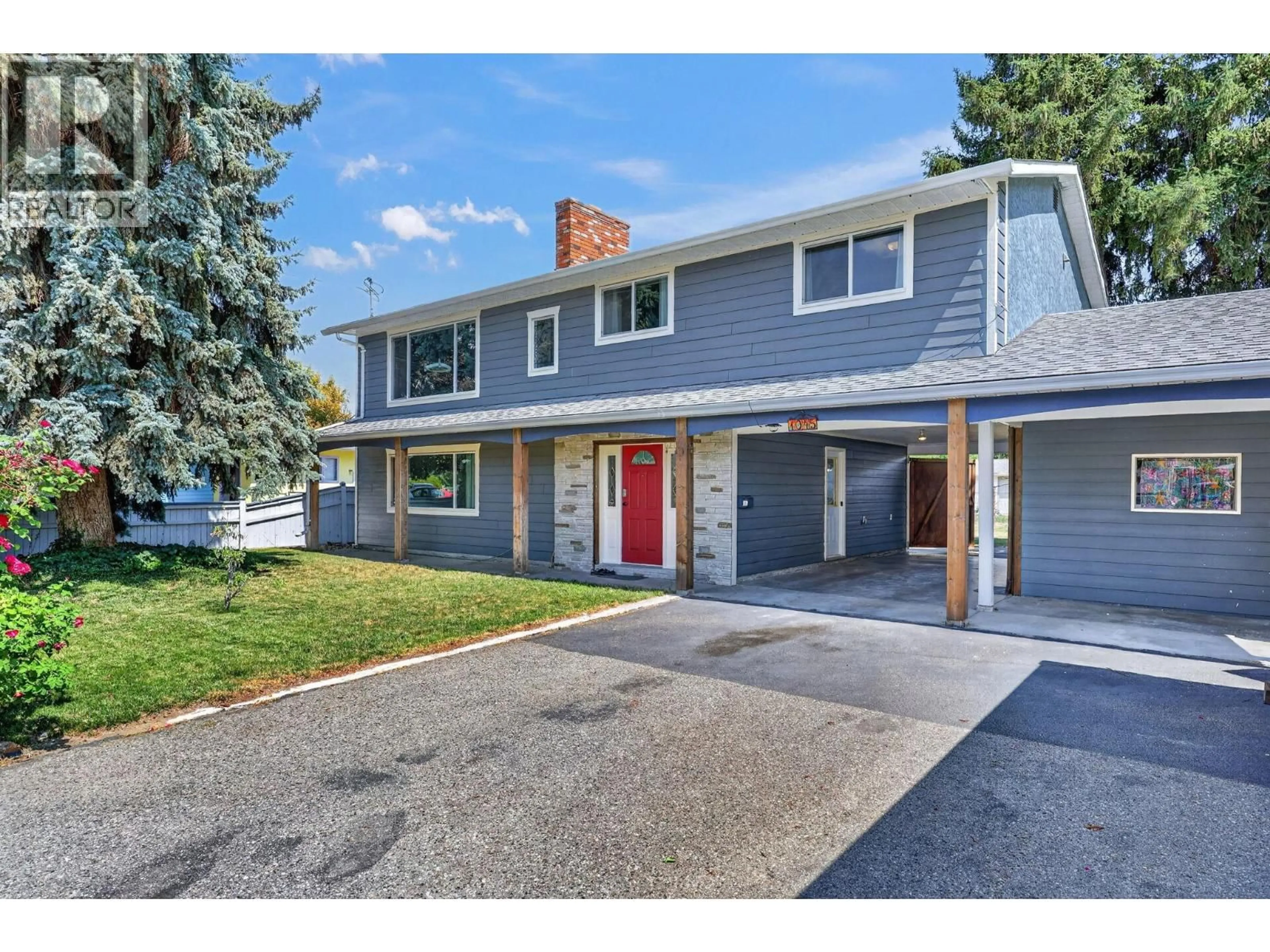 Home with vinyl exterior material, street for 1045 MITCHELL ROAD, Kelowna British Columbia V1X3W7