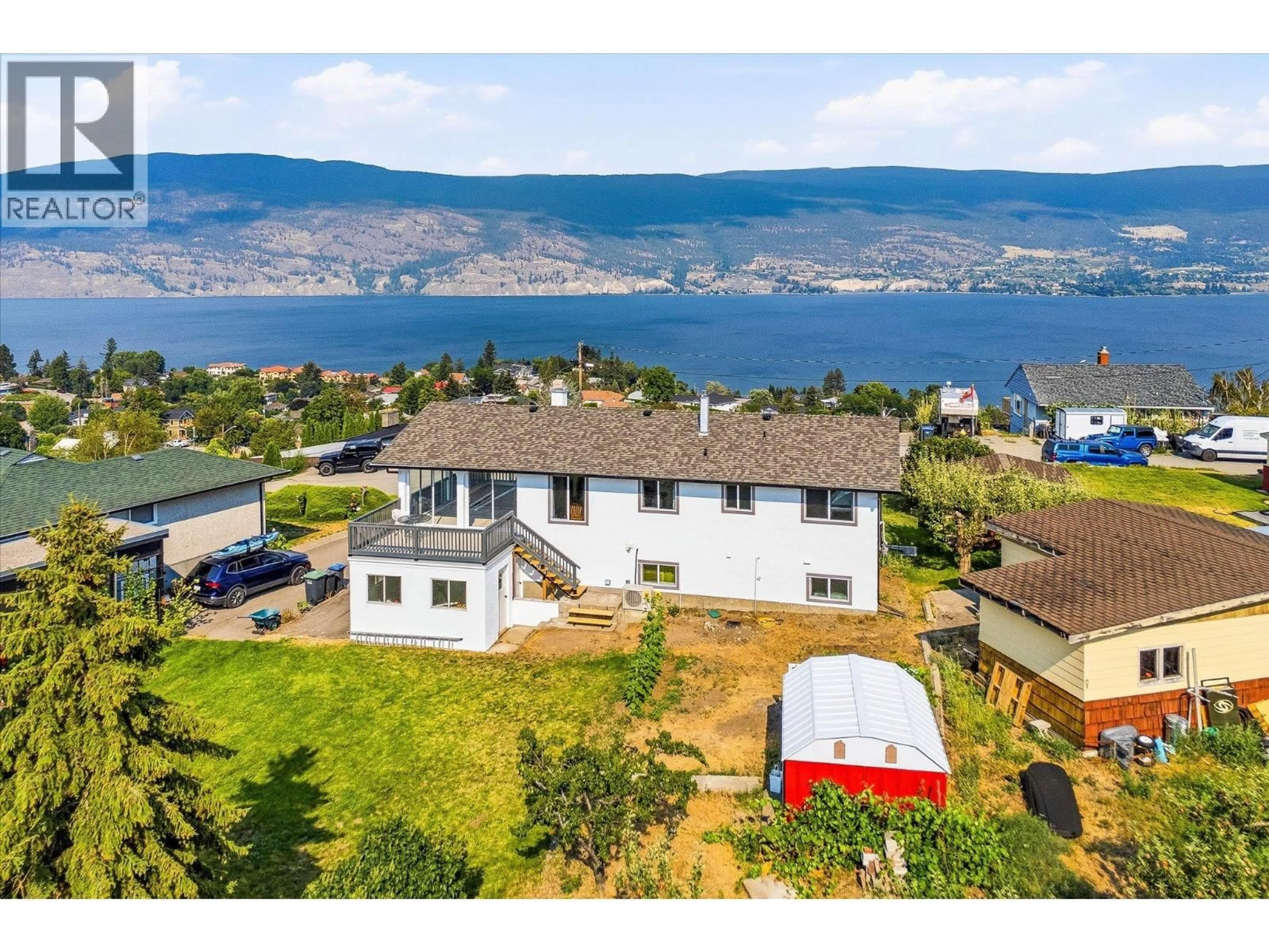 A pic from outside/outdoor area/front of a property/back of a property/a pic from drone, water/lake/river/ocean view for 13620 COOKE AVENUE, Summerland British Columbia V0H1Z1