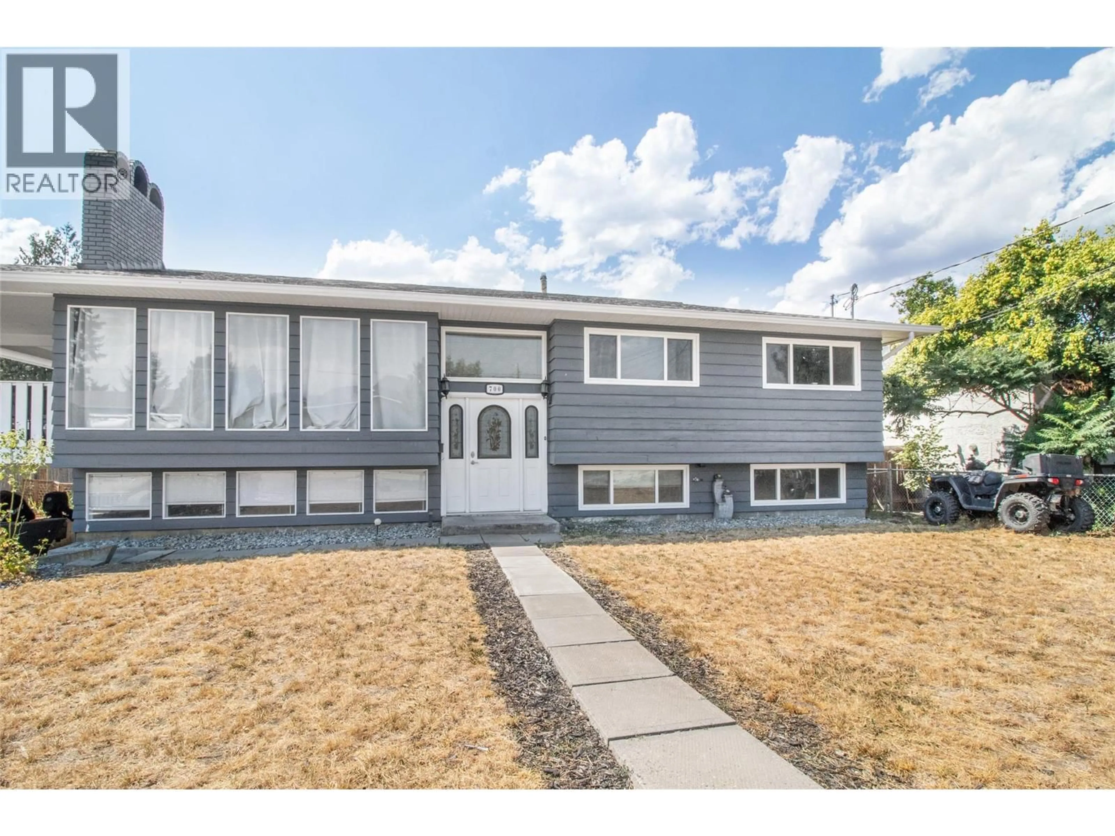 Home with vinyl exterior material, street for 700 MATT ROAD, Kelowna British Columbia V1X3V9