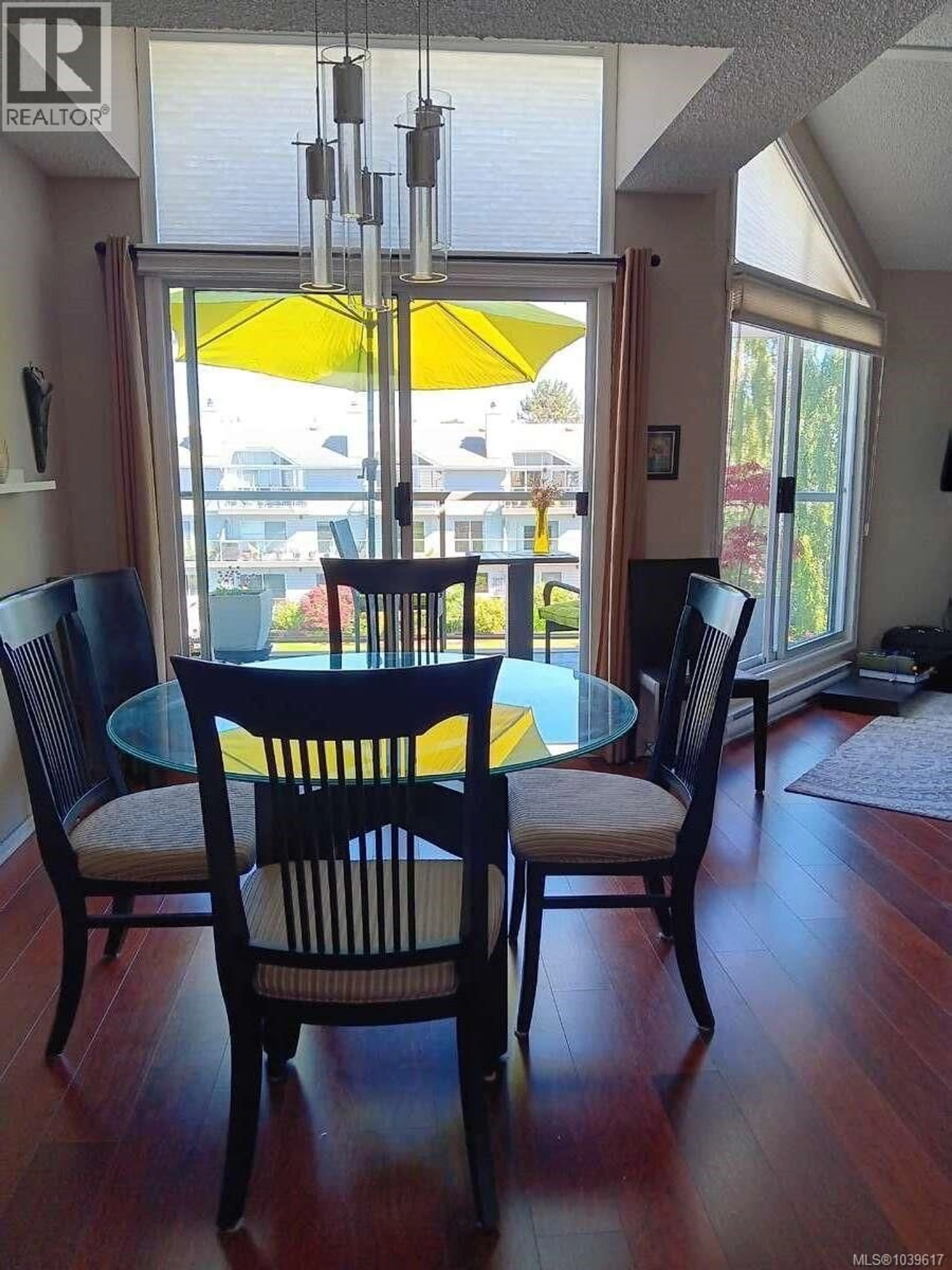 Dining room, wood/laminate floor for 303 - 10461 RESTHAVEN DRIVE, Sidney British Columbia V8L3H6