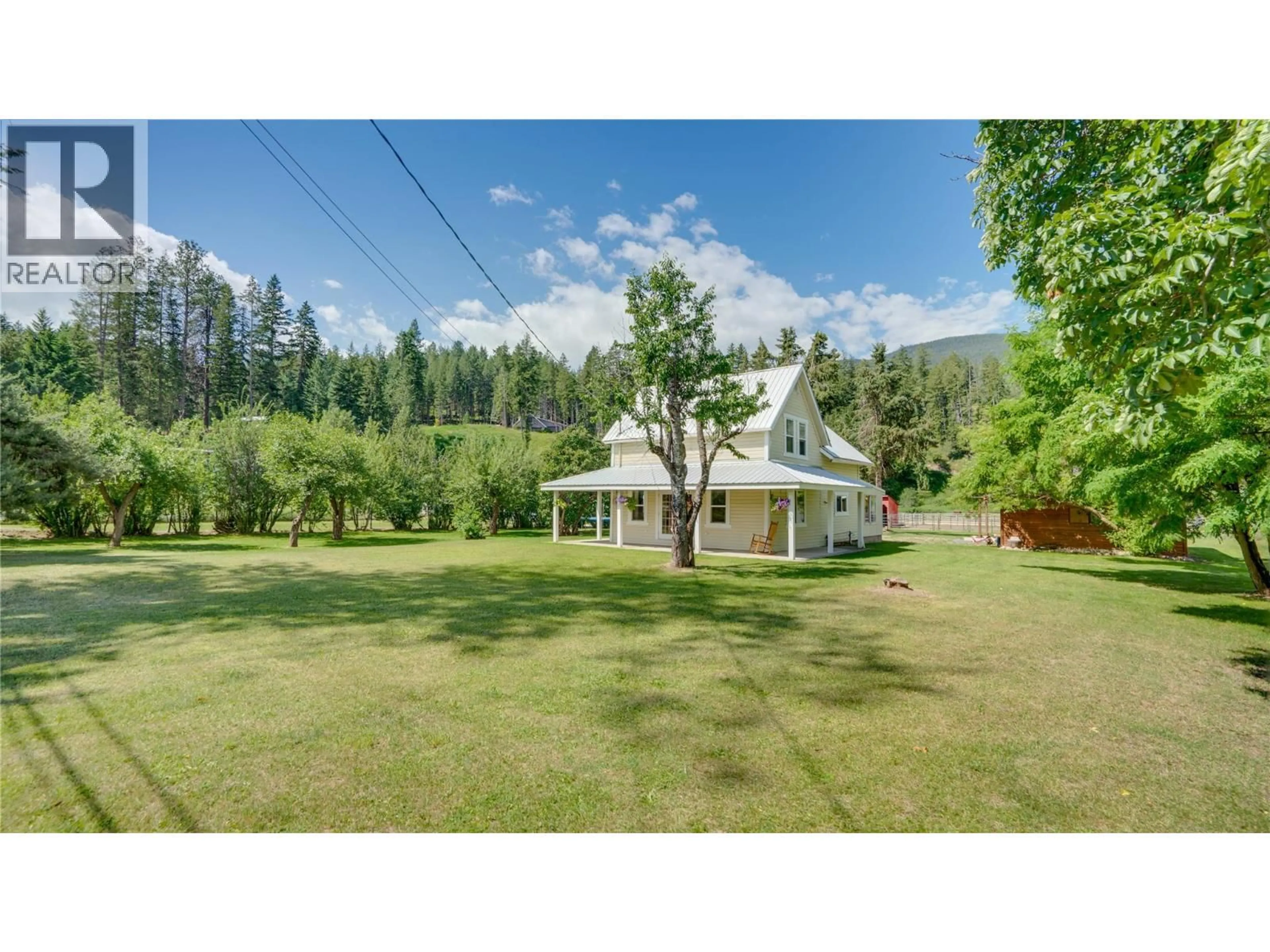 A pic from outside/outdoor area/front of a property/back of a property/a pic from drone, mountain view for 796 SALMON RIVER ROAD, Salmon Arm British Columbia V1E3E9