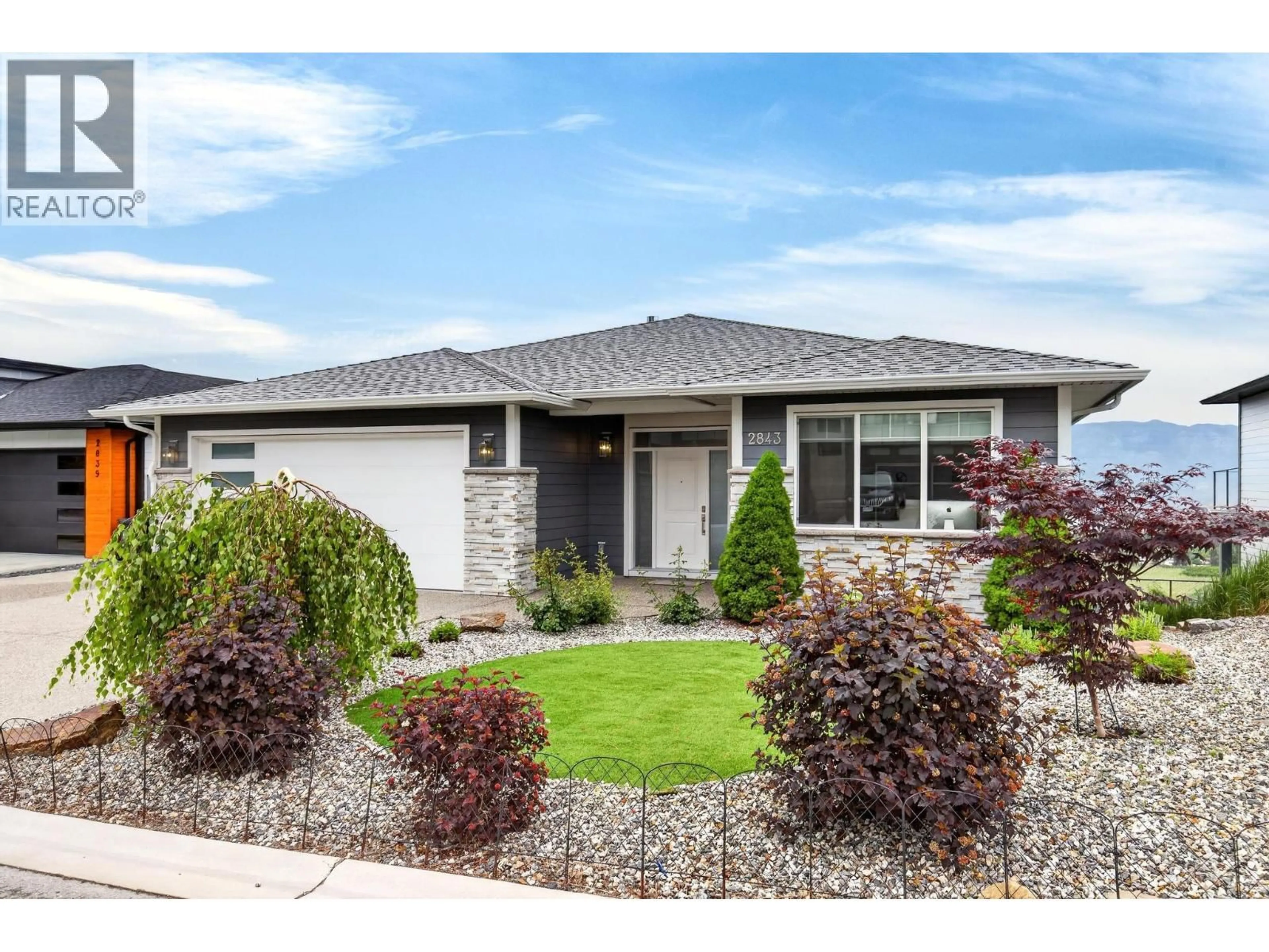 Home with vinyl exterior material, street for 2843 COPPER RIDGE DRIVE, Kelowna British Columbia V4T0E7