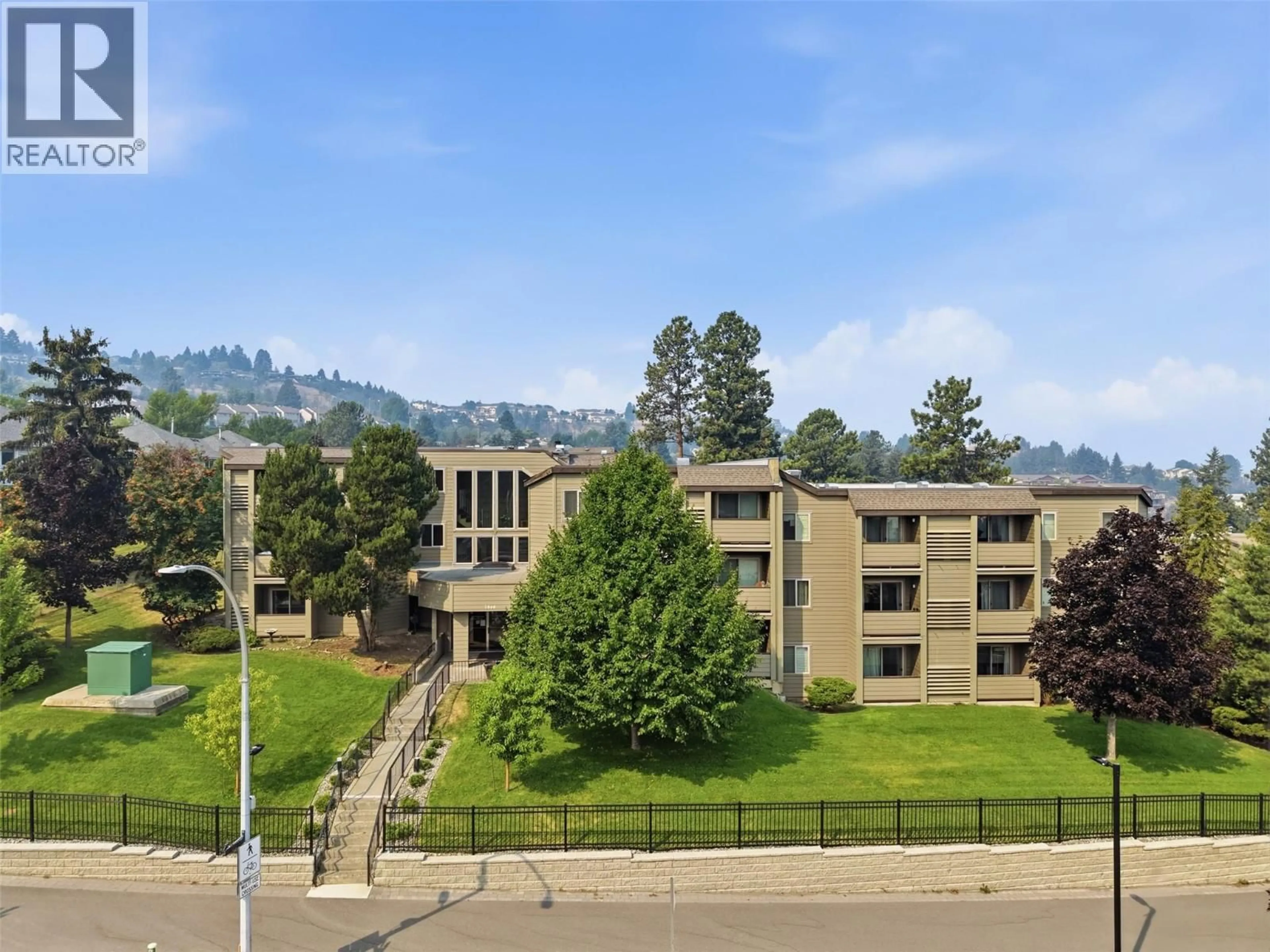A pic from outside/outdoor area/front of a property/back of a property/a pic from drone, mountain view for 224 - 1560 SUMMIT DRIVE, Kamloops British Columbia V2E1R5