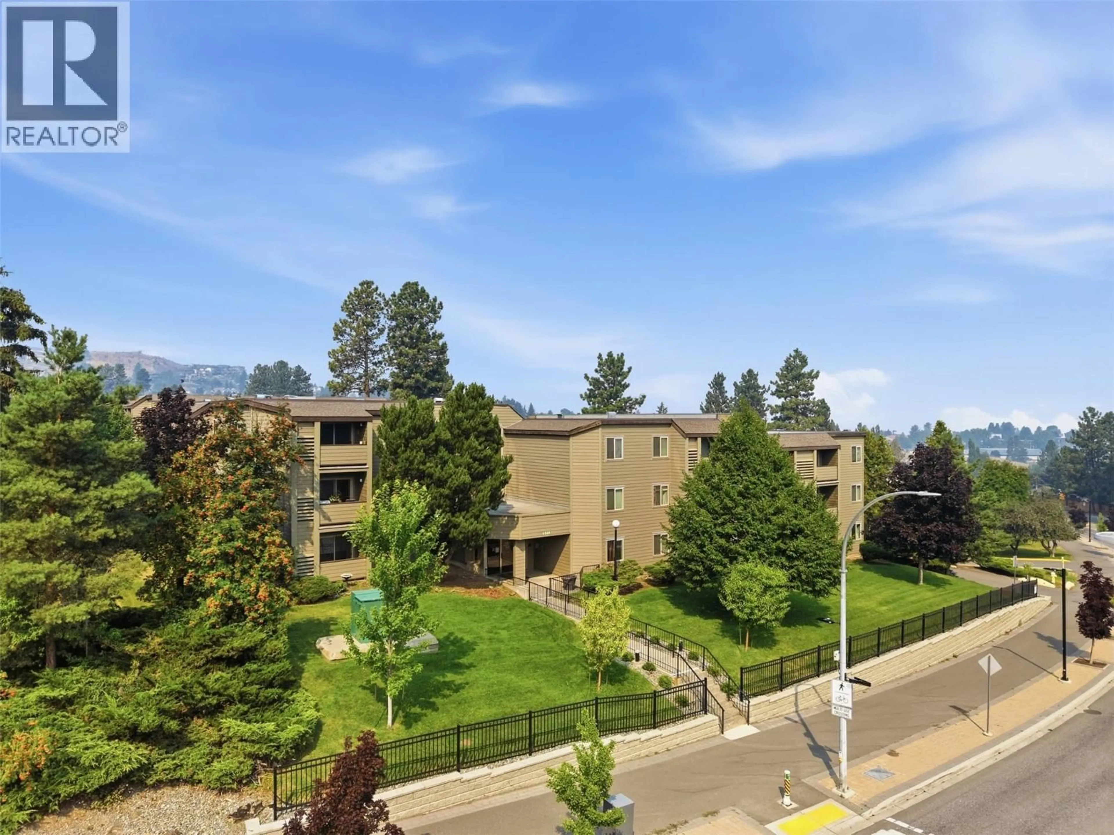 A pic from outside/outdoor area/front of a property/back of a property/a pic from drone, mountain view for 224 - 1560 SUMMIT DRIVE, Kamloops British Columbia V2E1R5