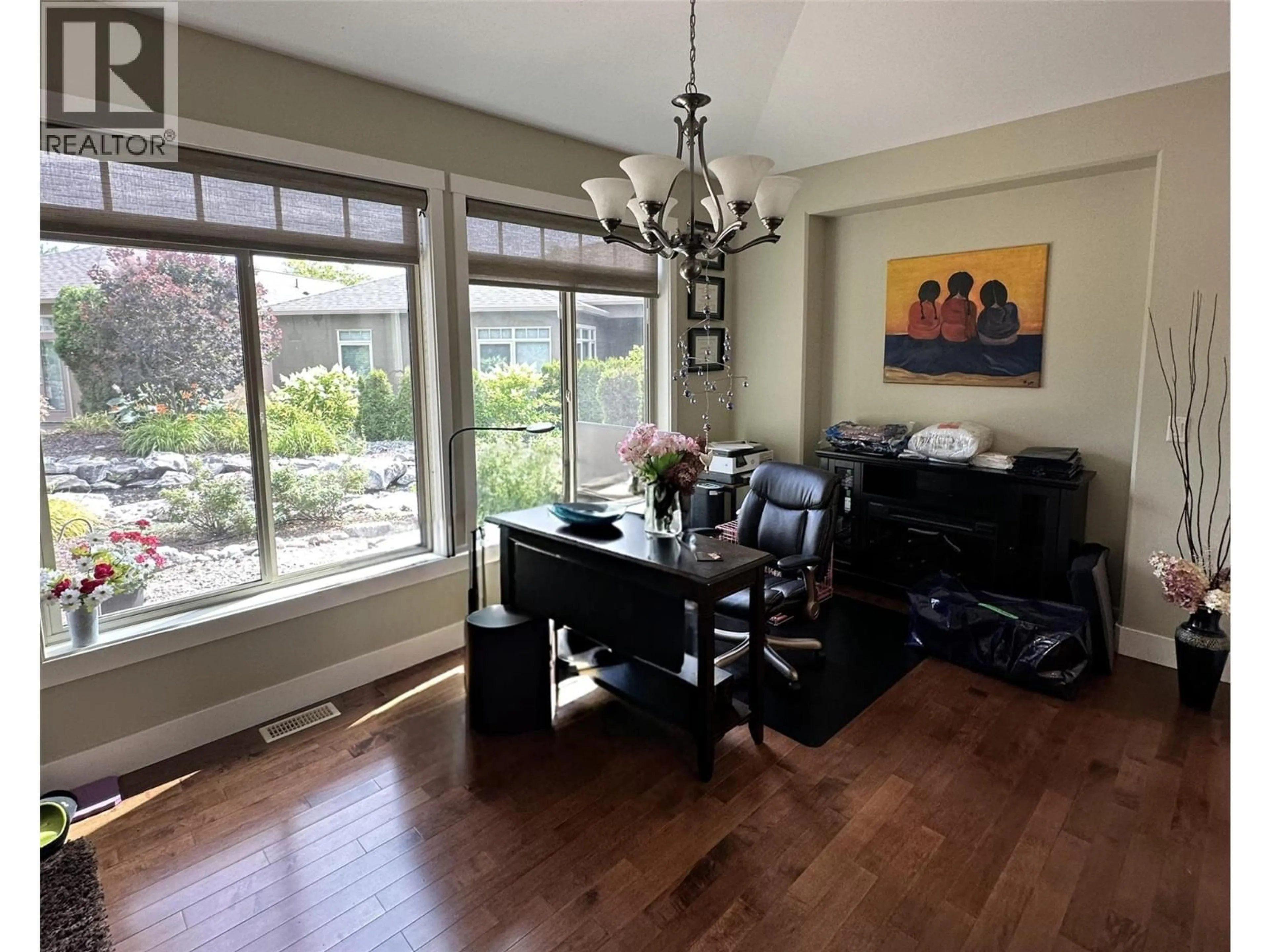 Dining room, wood/laminate floor for 34 - 6833 MEADOWS DRIVE, Oliver British Columbia V0H1T4