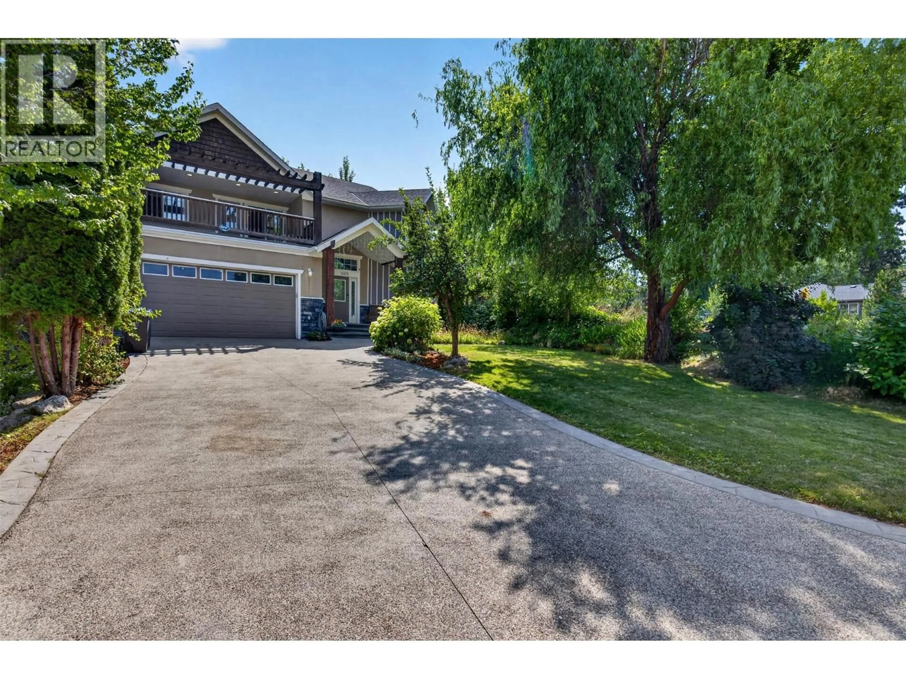 A pic from outside/outdoor area/front of a property/back of a property/a pic from drone, street for 1669 AUTUMN ROAD, Kelowna British Columbia V1P1E8