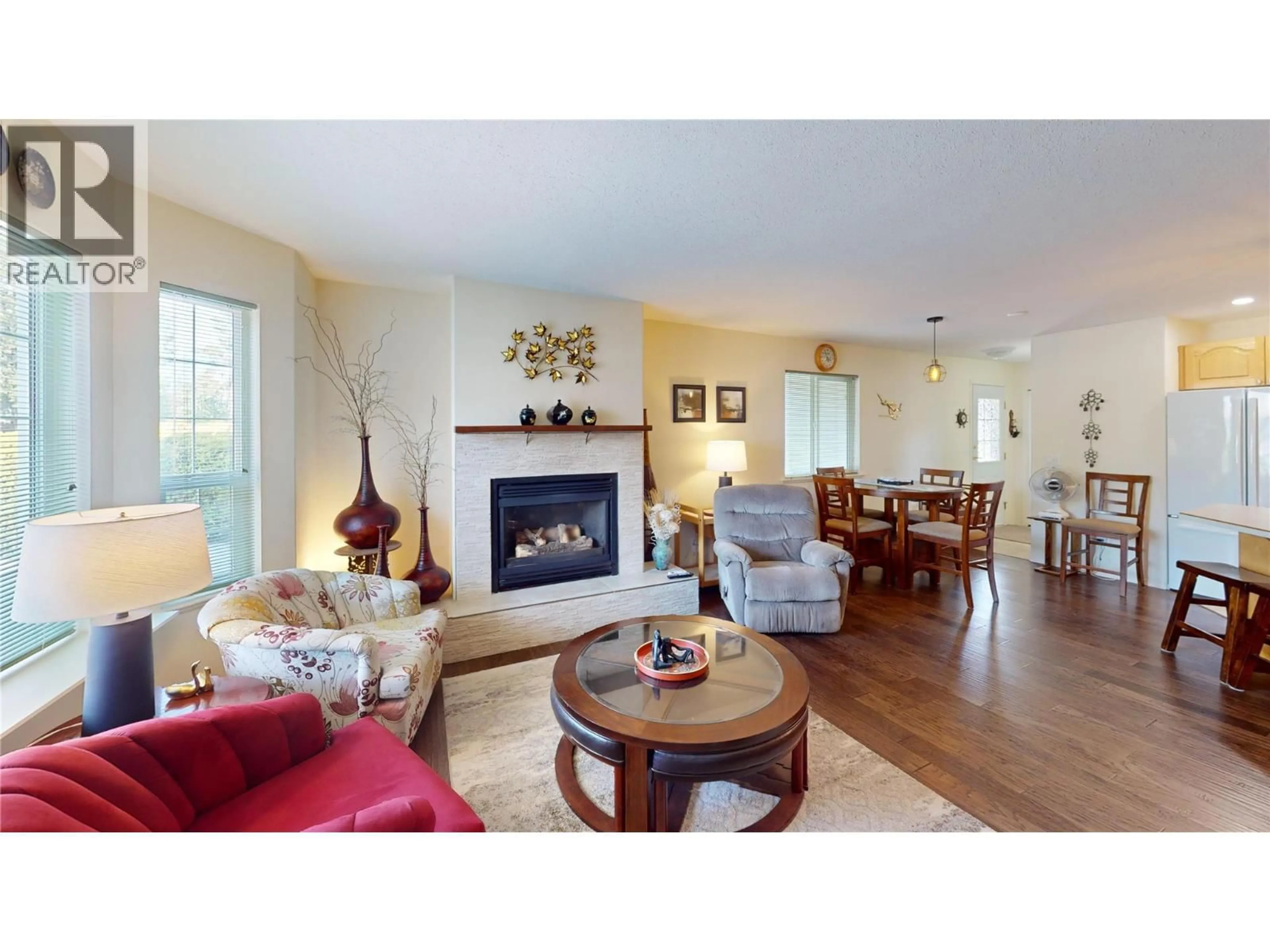 Living room with furniture, wood/laminate floor for 7 - 1510 BIRCH STREET, Creston British Columbia V0B1G3