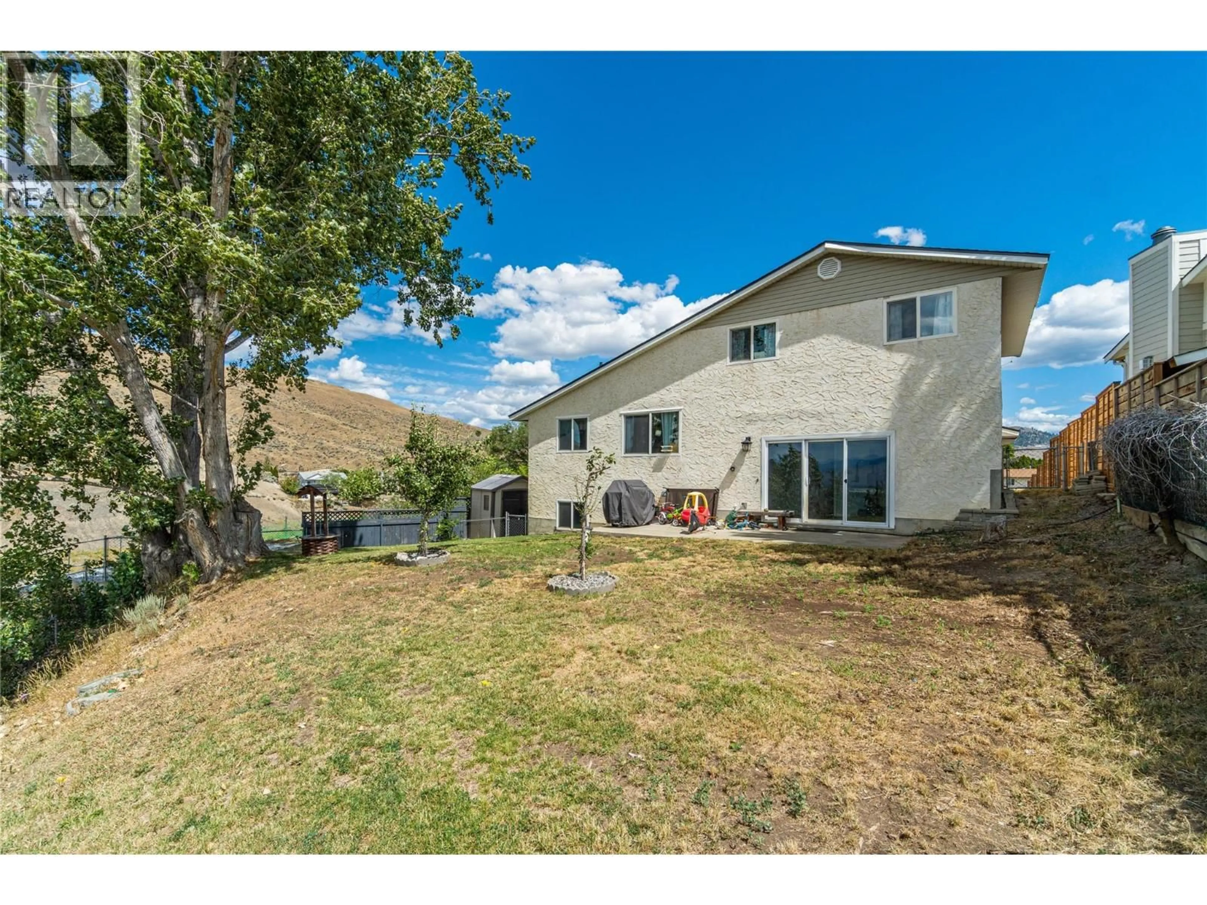 A pic from outside/outdoor area/front of a property/back of a property/a pic from drone, mountain view for 1579 NAPIER PLACE, Kamloops British Columbia V2B7S1