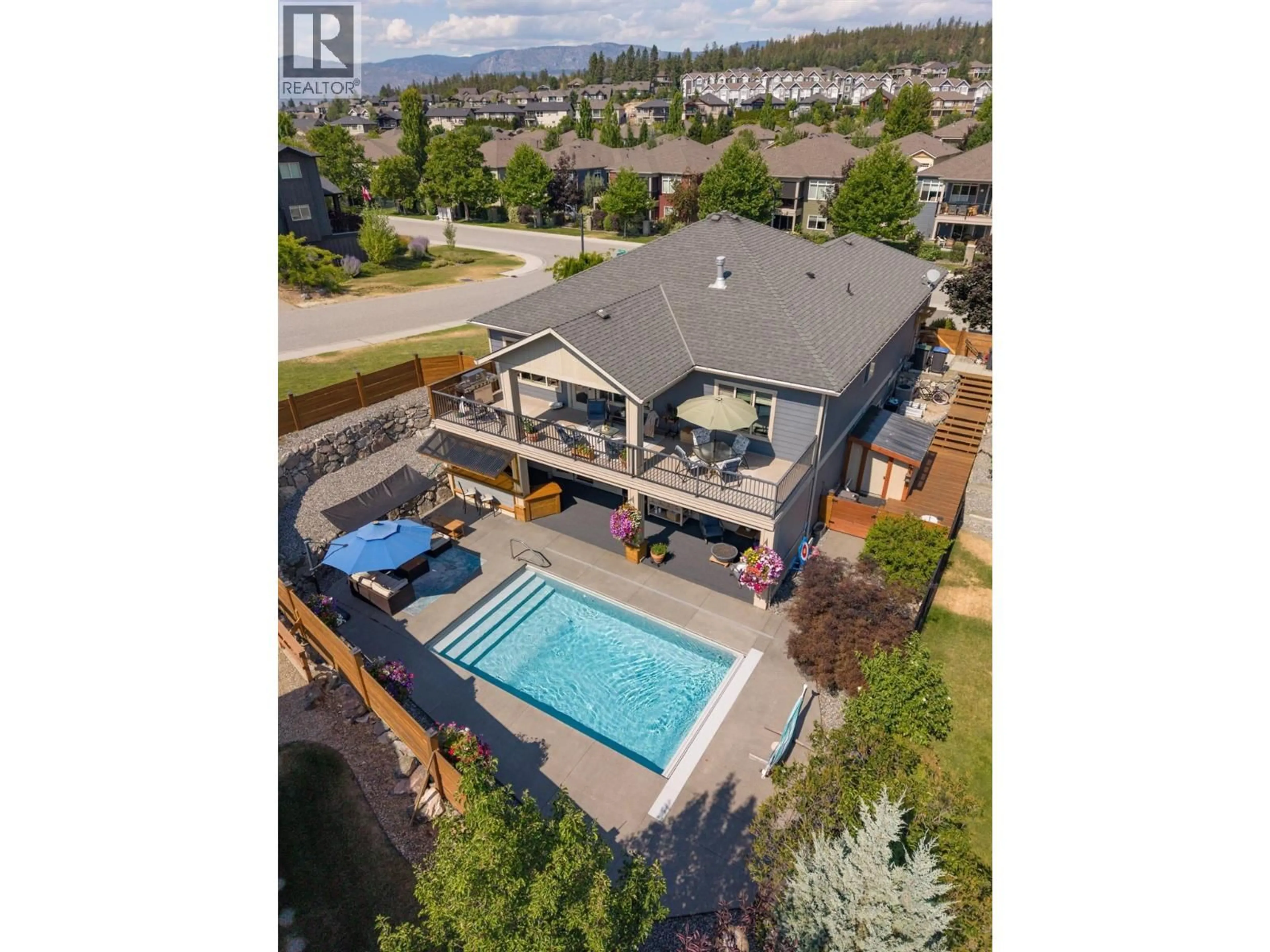 A pic from outside/outdoor area/front of a property/back of a property/a pic from drone, water/lake/river/ocean view for 12931 EAST RIDGE DRIVE, Lake Country British Columbia V4V2R2