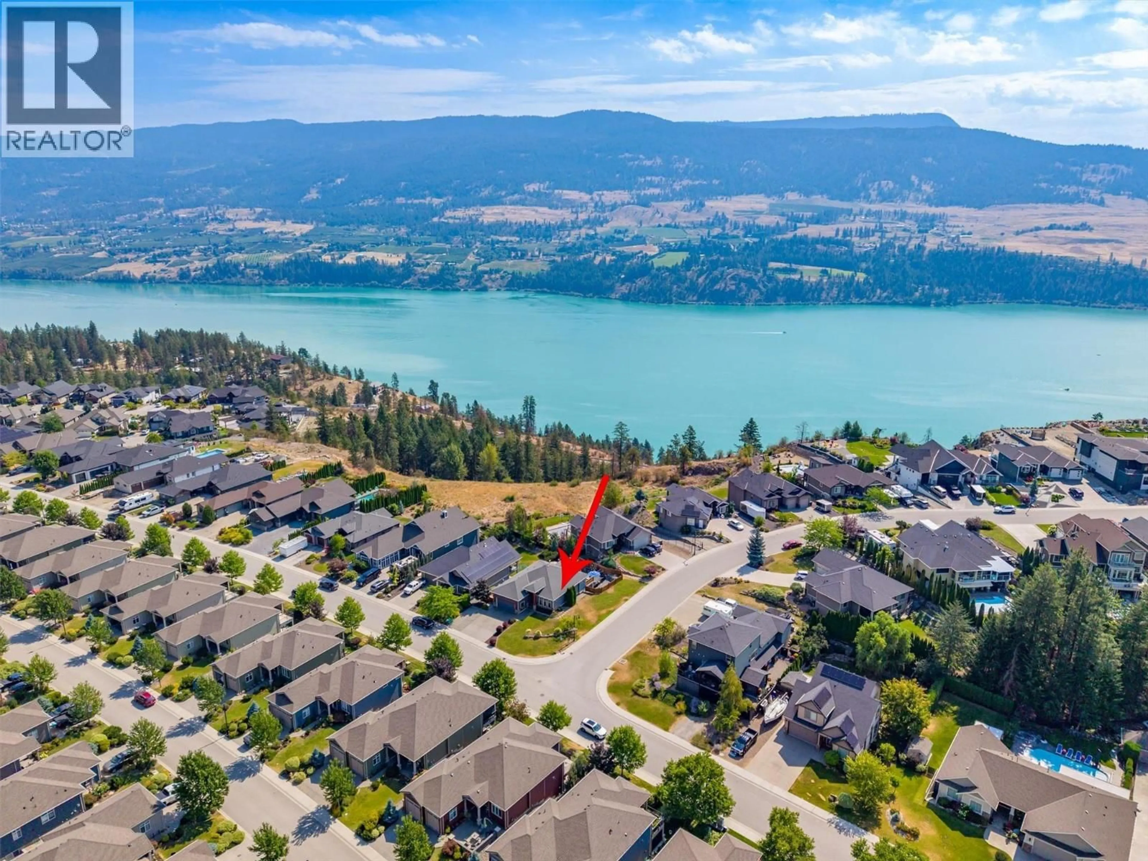 A pic from outside/outdoor area/front of a property/back of a property/a pic from drone, water/lake/river/ocean view for 12931 EAST RIDGE DRIVE, Lake Country British Columbia V4V2R2