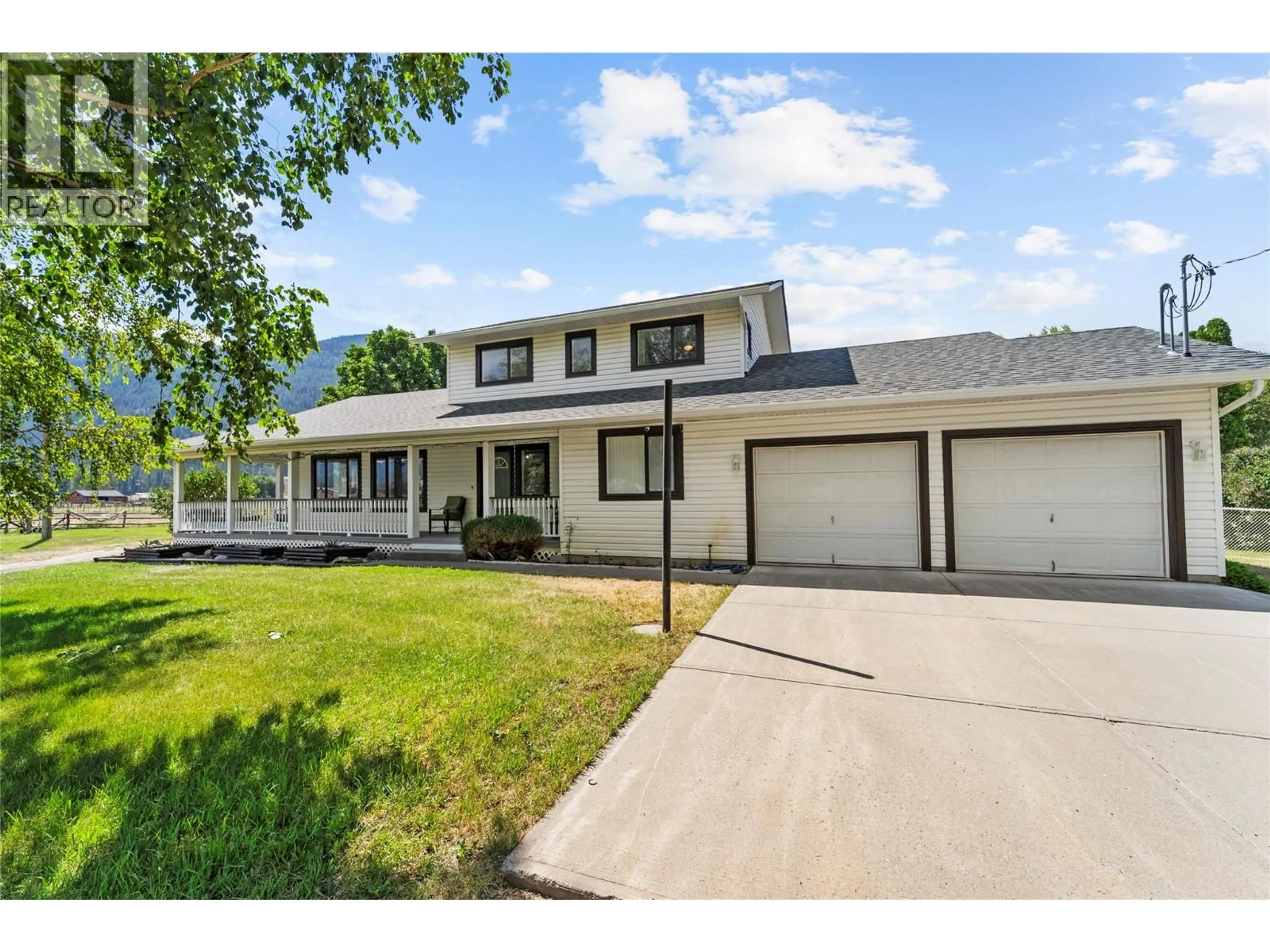 Home with vinyl exterior material, street for 1888 NICOLLS ROAD, Merritt British Columbia V1K1B8