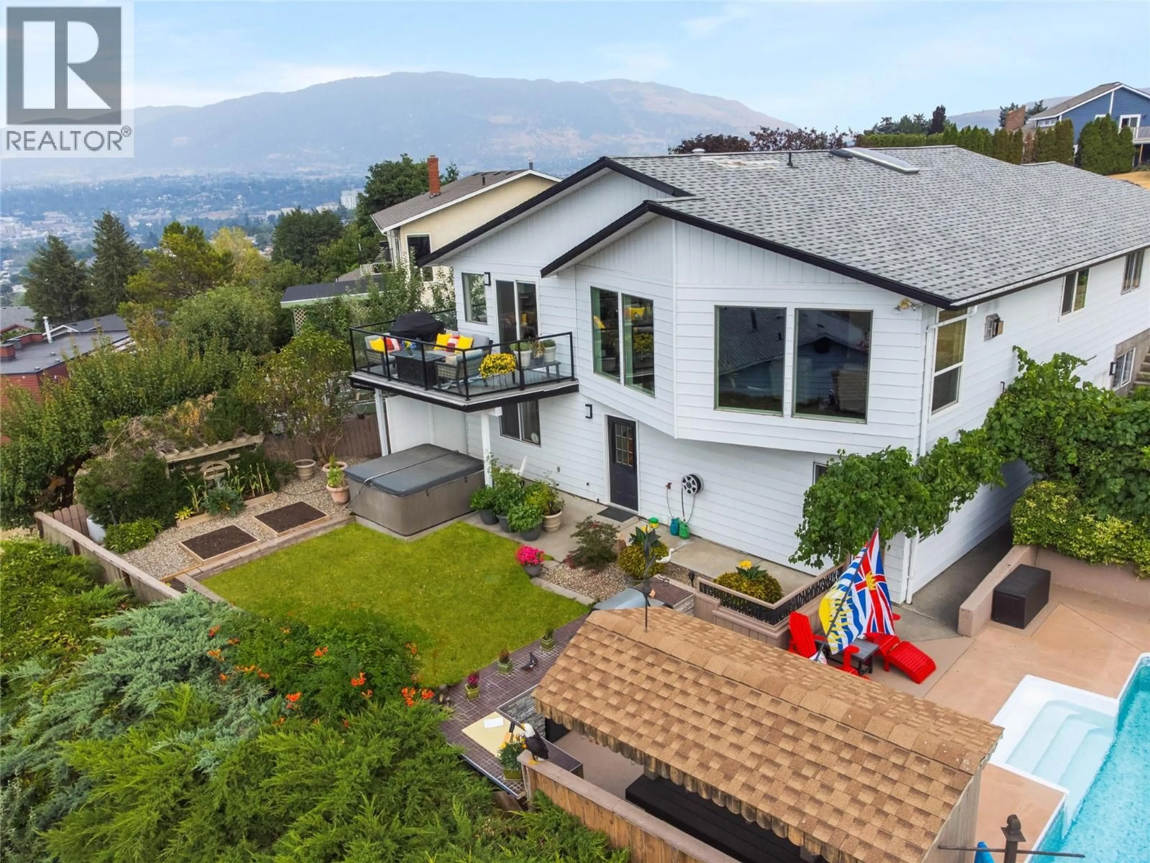 A pic from outside/outdoor area/front of a property/back of a property/a pic from drone, mountain view for 4119 15 AVENUE, Vernon British Columbia V1T8H1