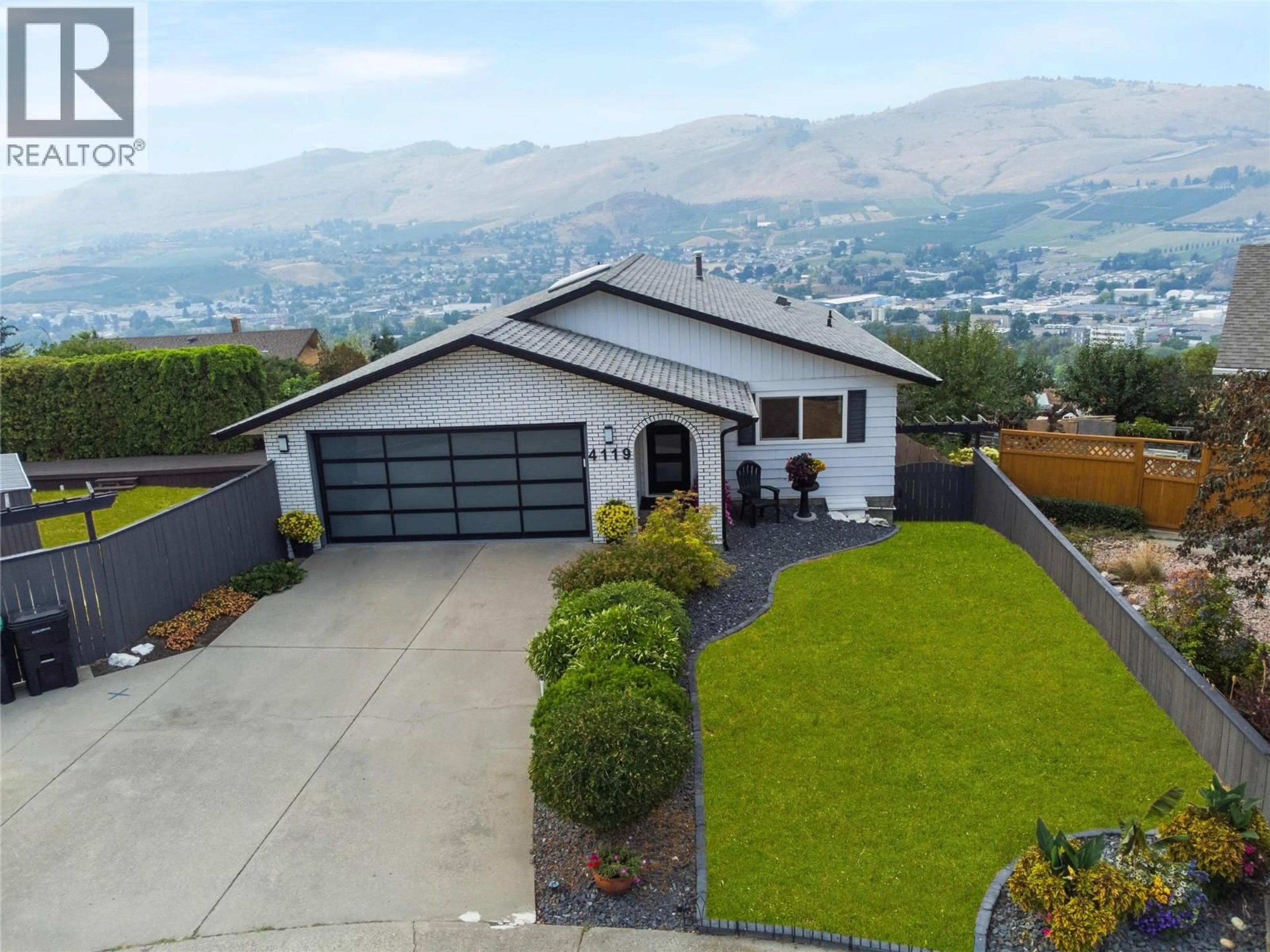 A pic from outside/outdoor area/front of a property/back of a property/a pic from drone, mountain view for 4119 15 AVENUE, Vernon British Columbia V1T8H1
