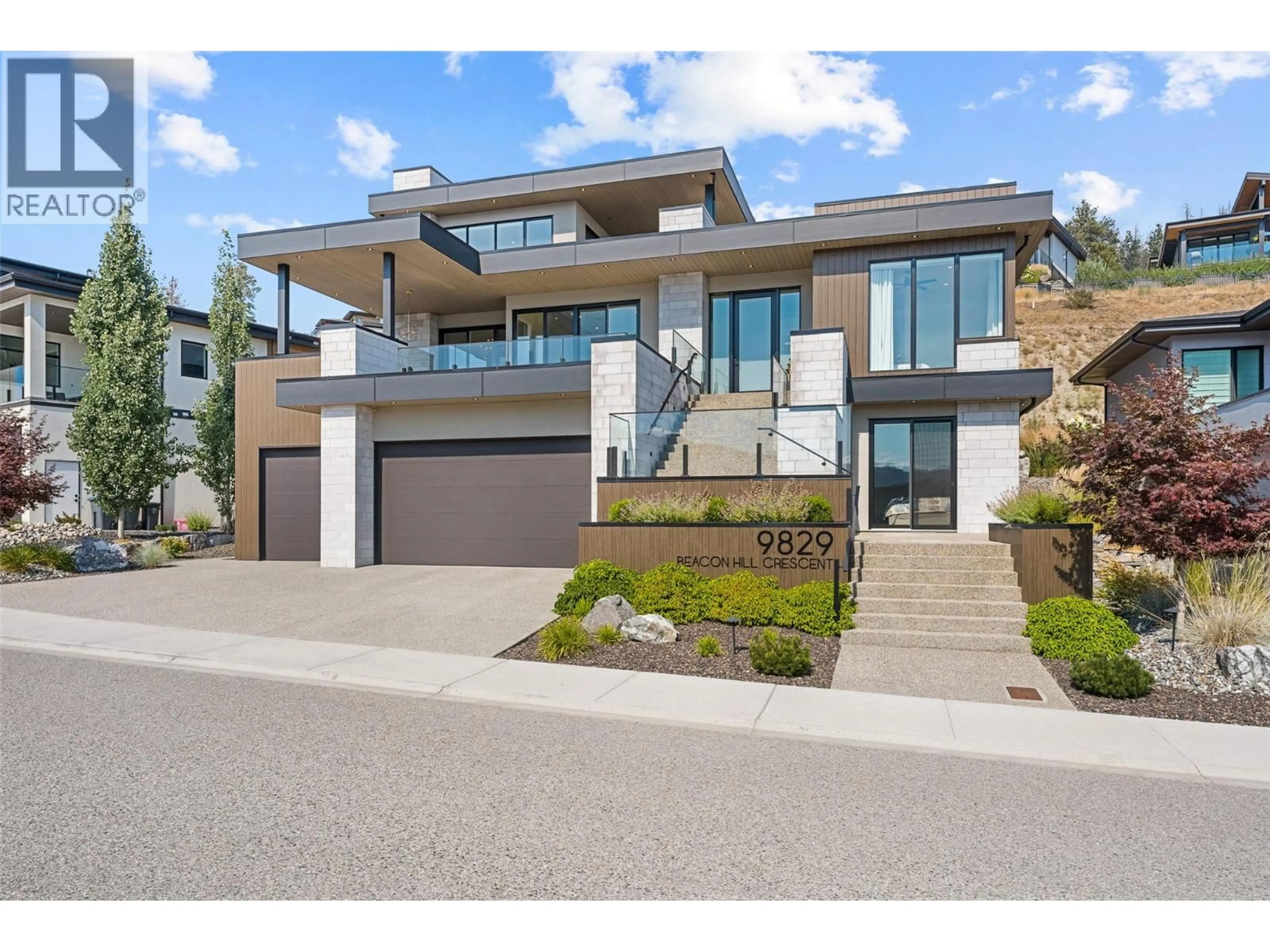 Home with brick exterior material, street for 9829 BEACON HILL CRESCENT, Lake Country British Columbia V4V0A9