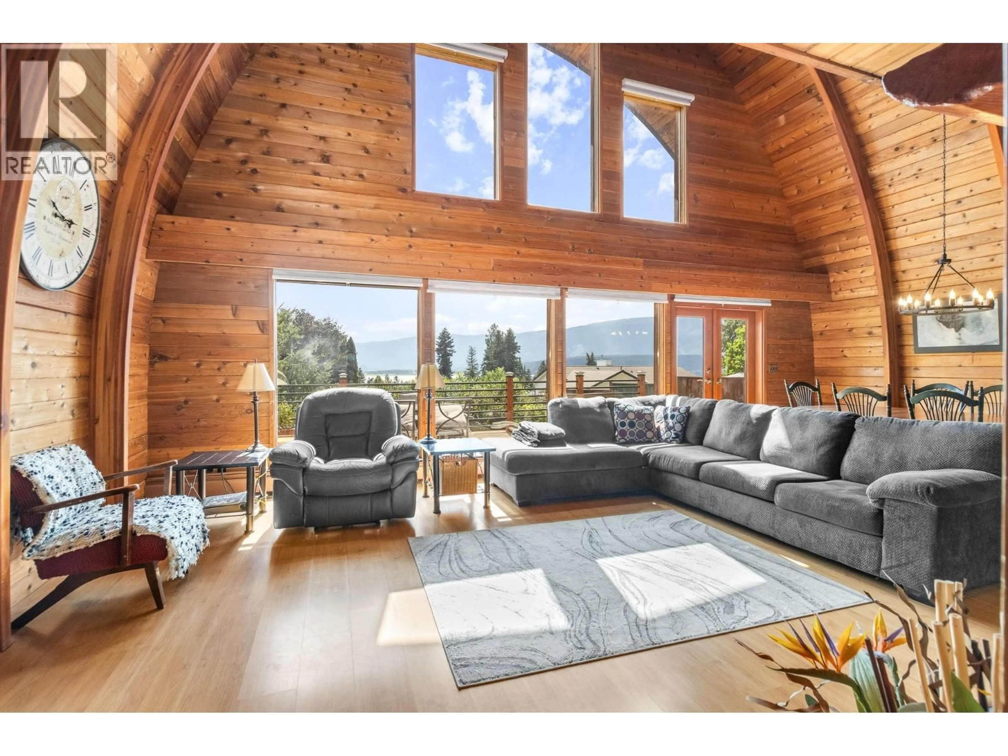 Living room with furniture, wood/laminate floor for 5261 LAKESHORE ROAD NORTHEAST, Salmon Arm British Columbia V1E3P5
