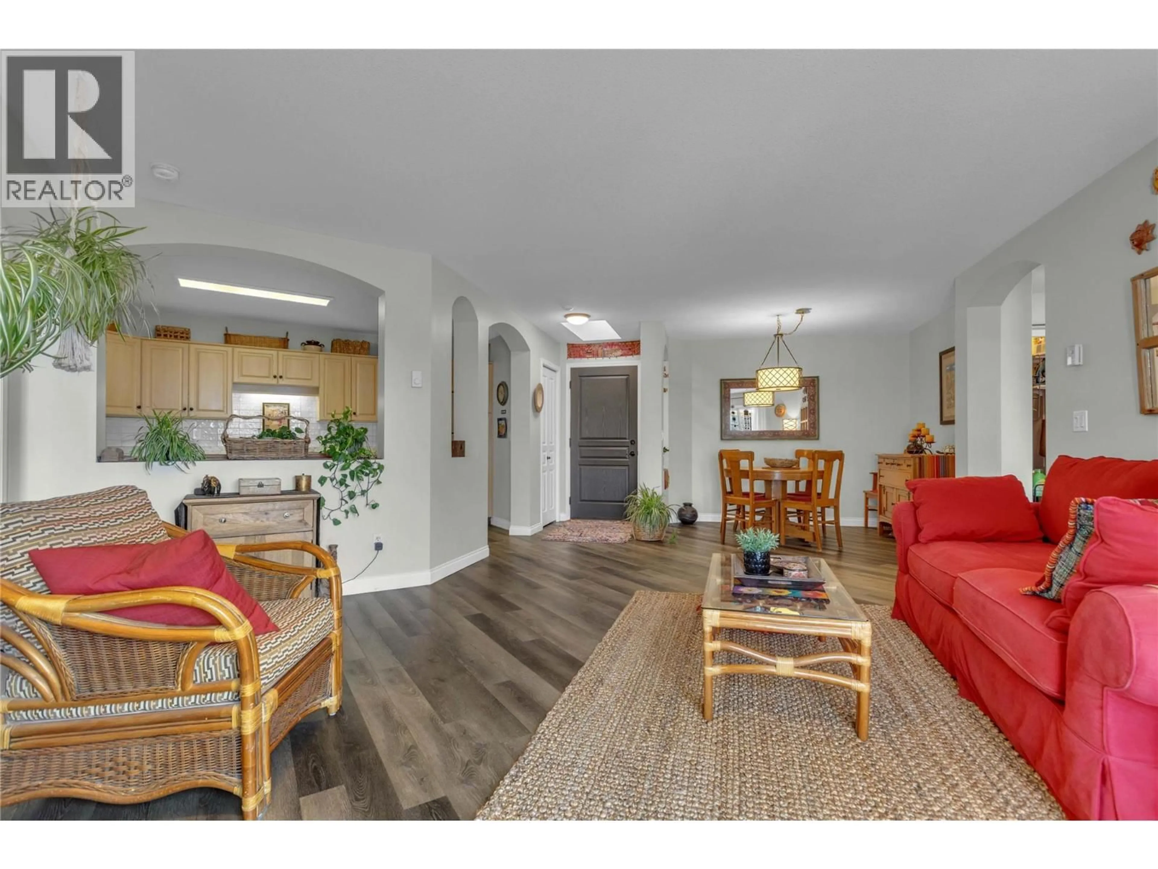 Living room with furniture, wood/laminate floor for 314 - 3880 BROWN ROAD, West Kelowna British Columbia V4T2J5