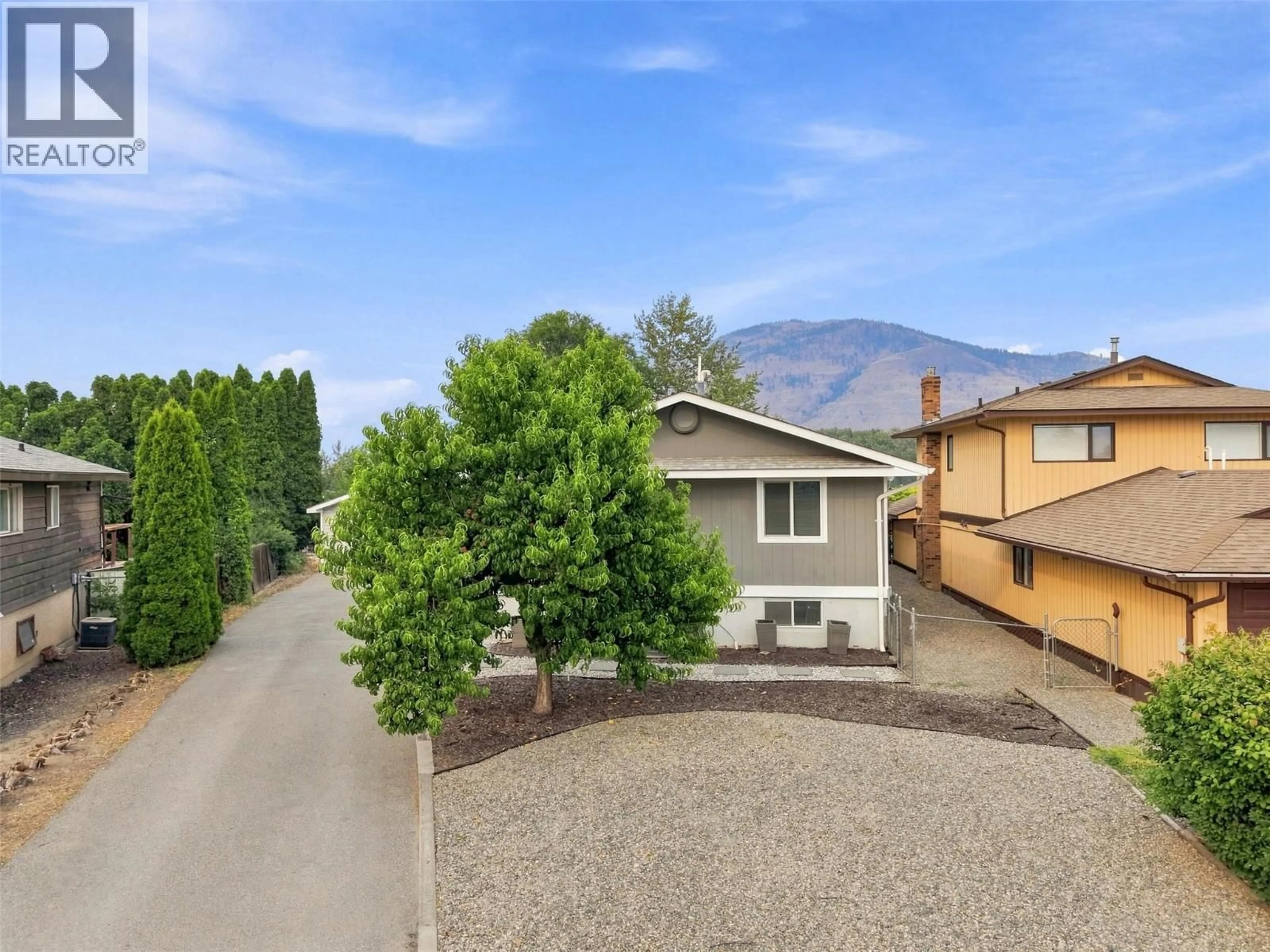 A pic from outside/outdoor area/front of a property/back of a property/a pic from drone, mountain view for 728 DRIFTWOOD PLACE, Kamloops British Columbia V2B7Y5