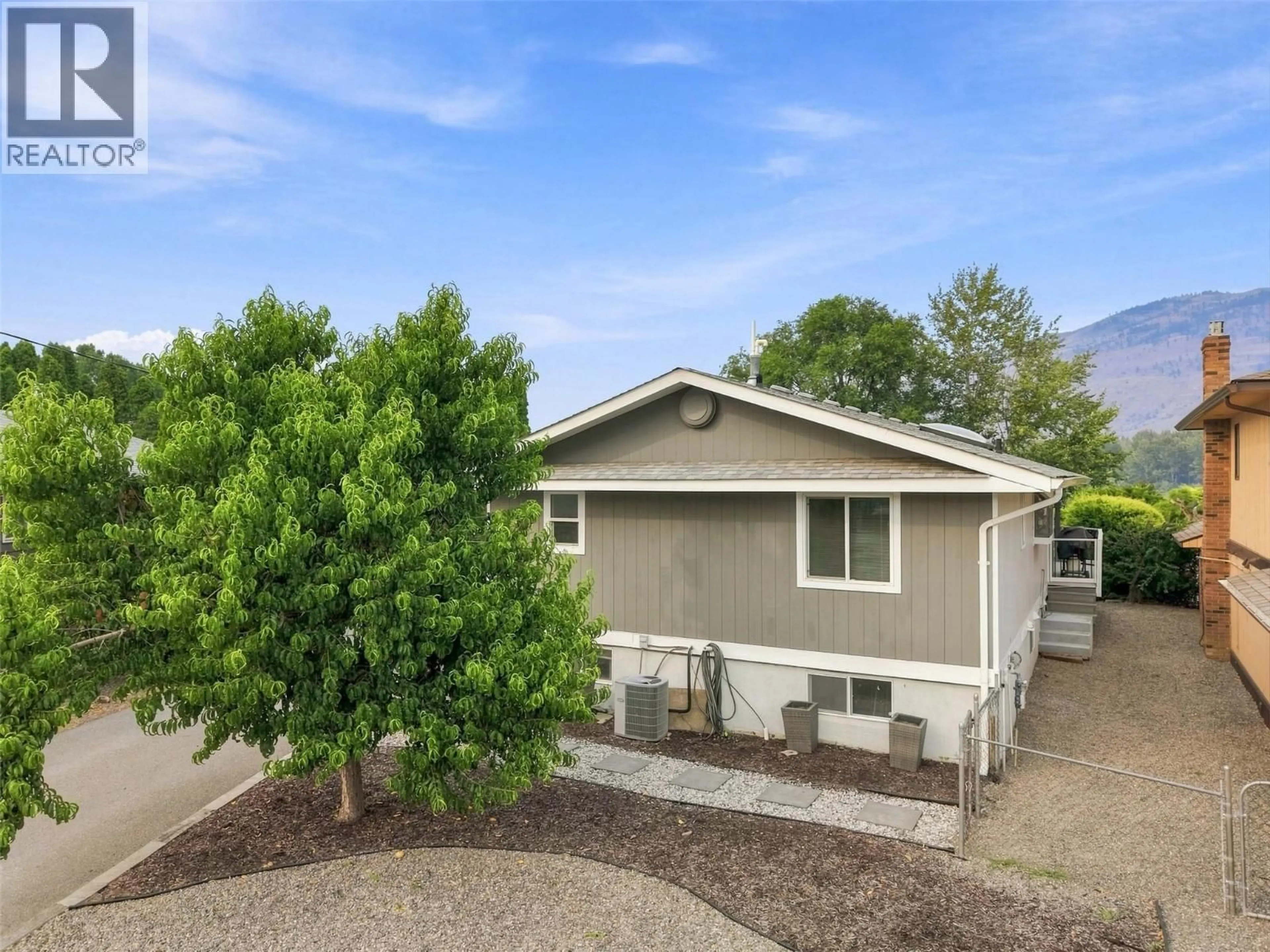 Home with vinyl exterior material, street for 728 DRIFTWOOD PLACE, Kamloops British Columbia V2B7Y5
