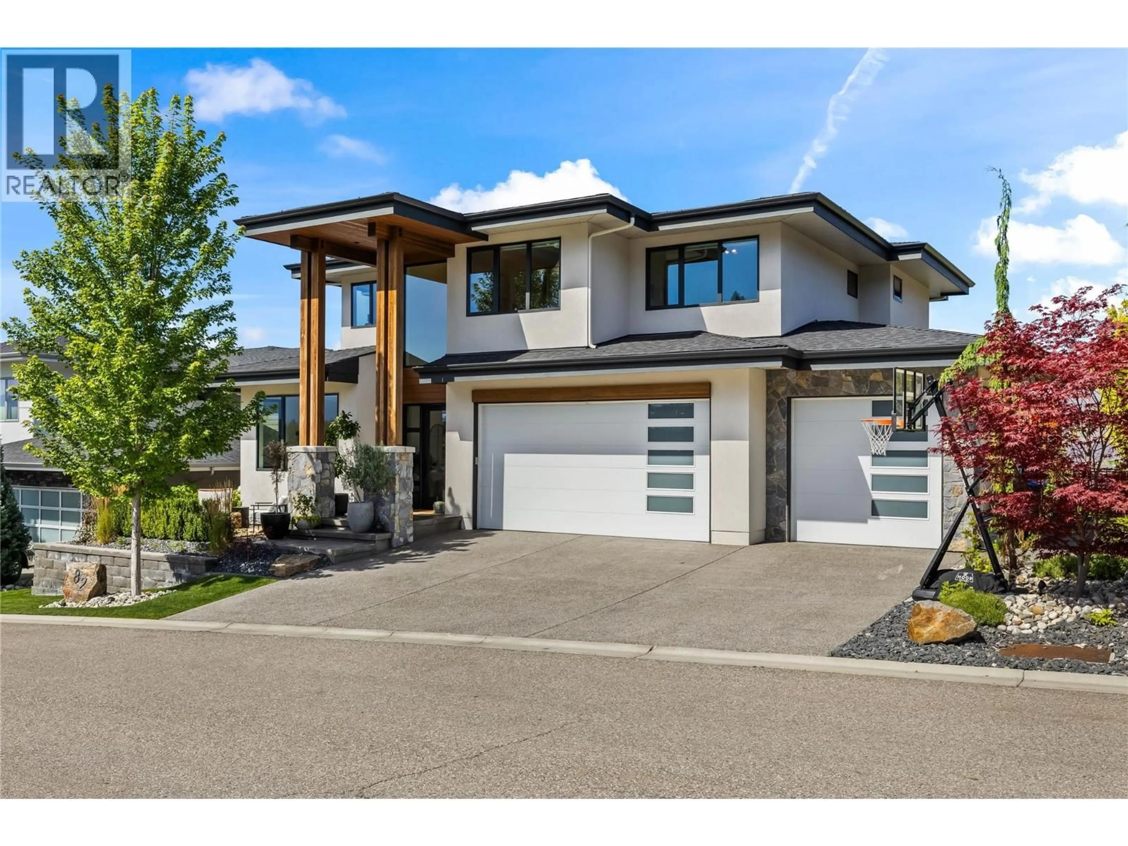 Home with vinyl exterior material, street for 82 RED SKY COURT, Kelowna British Columbia V1V3G4