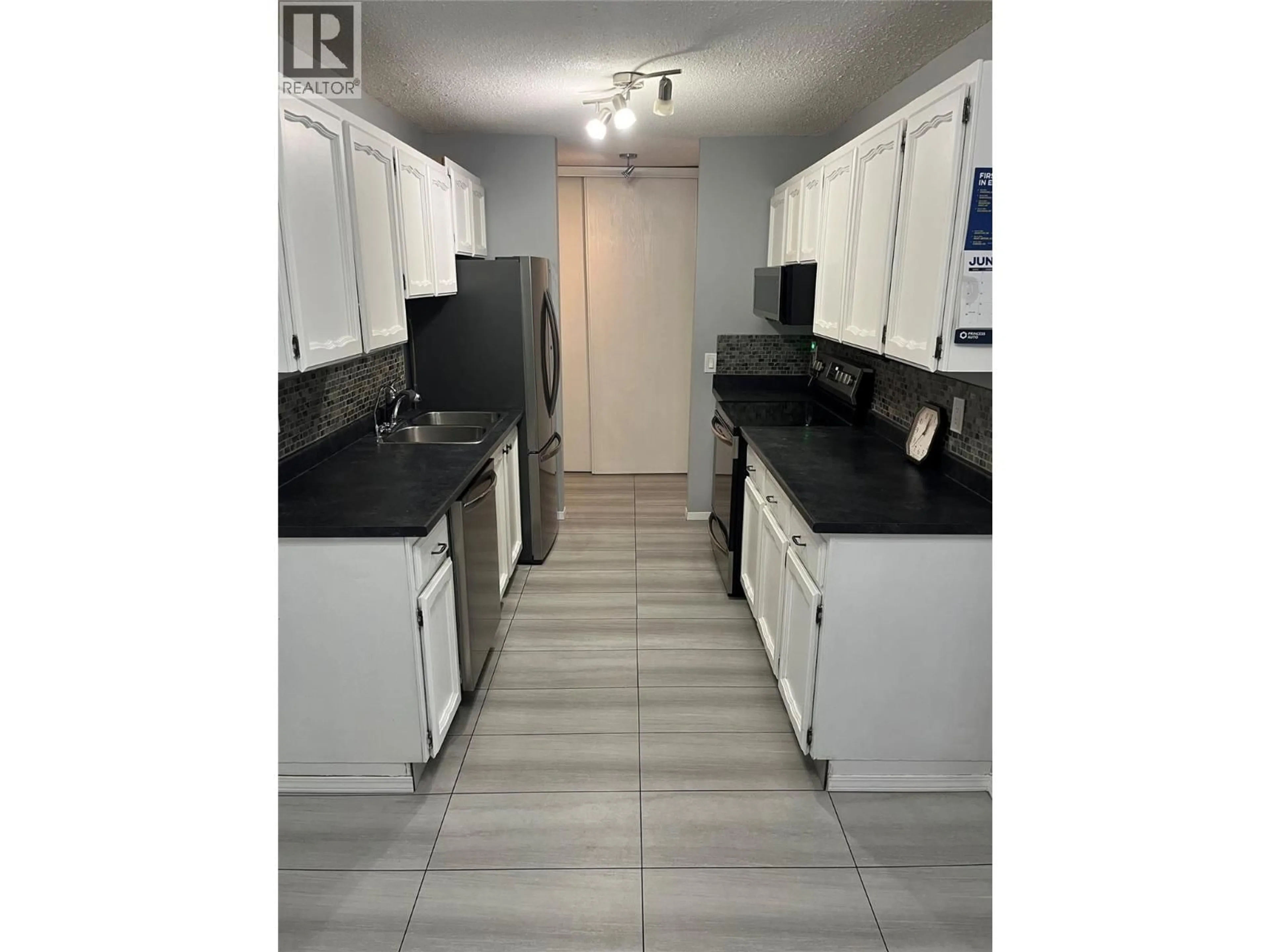 Standard kitchen, ceramic/tile floor for 202 - 555 ROWCLIFFE AVENUE, Kelowna British Columbia V1Y5X8