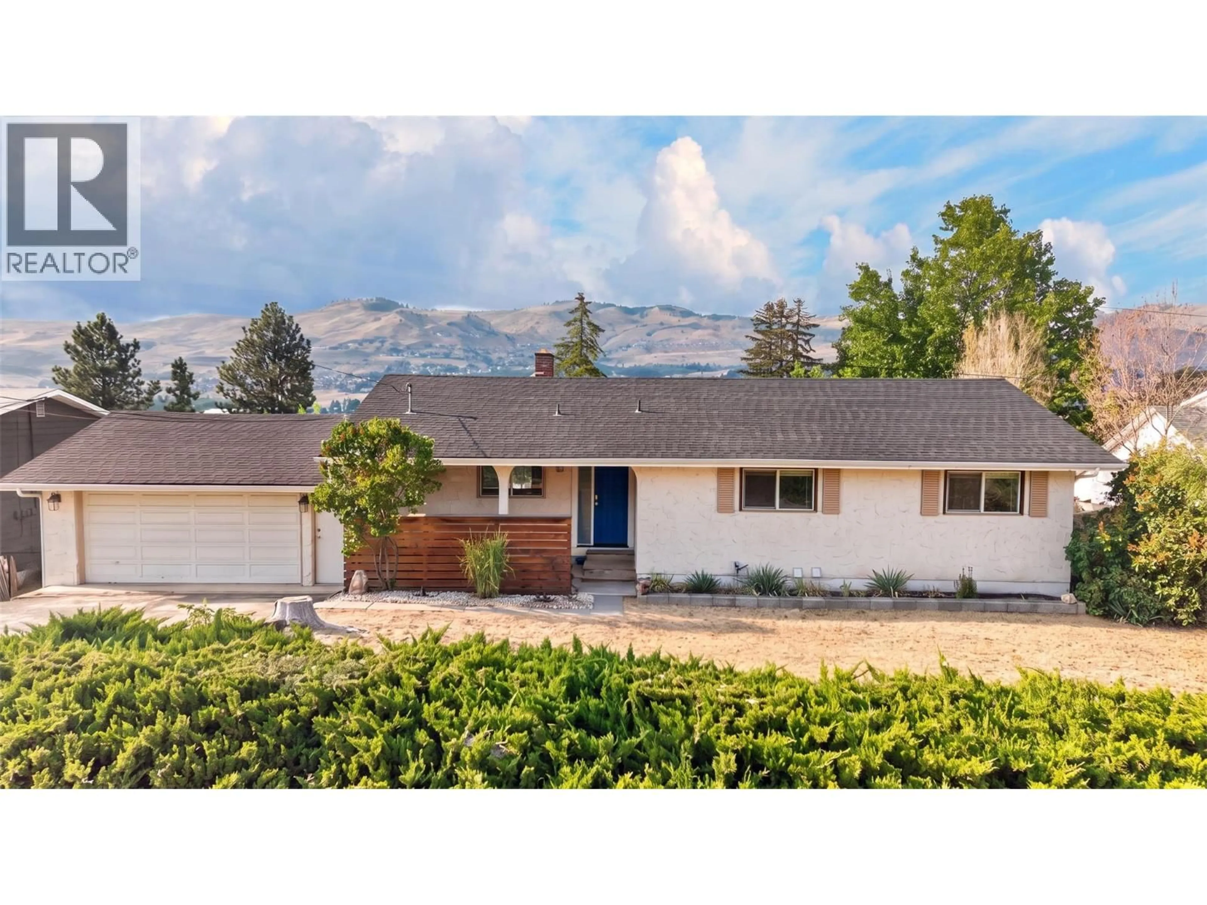 A pic from outside/outdoor area/front of a property/back of a property/a pic from drone, mountain view for 6531 LONGACRE DRIVE, Vernon British Columbia V1H1H9