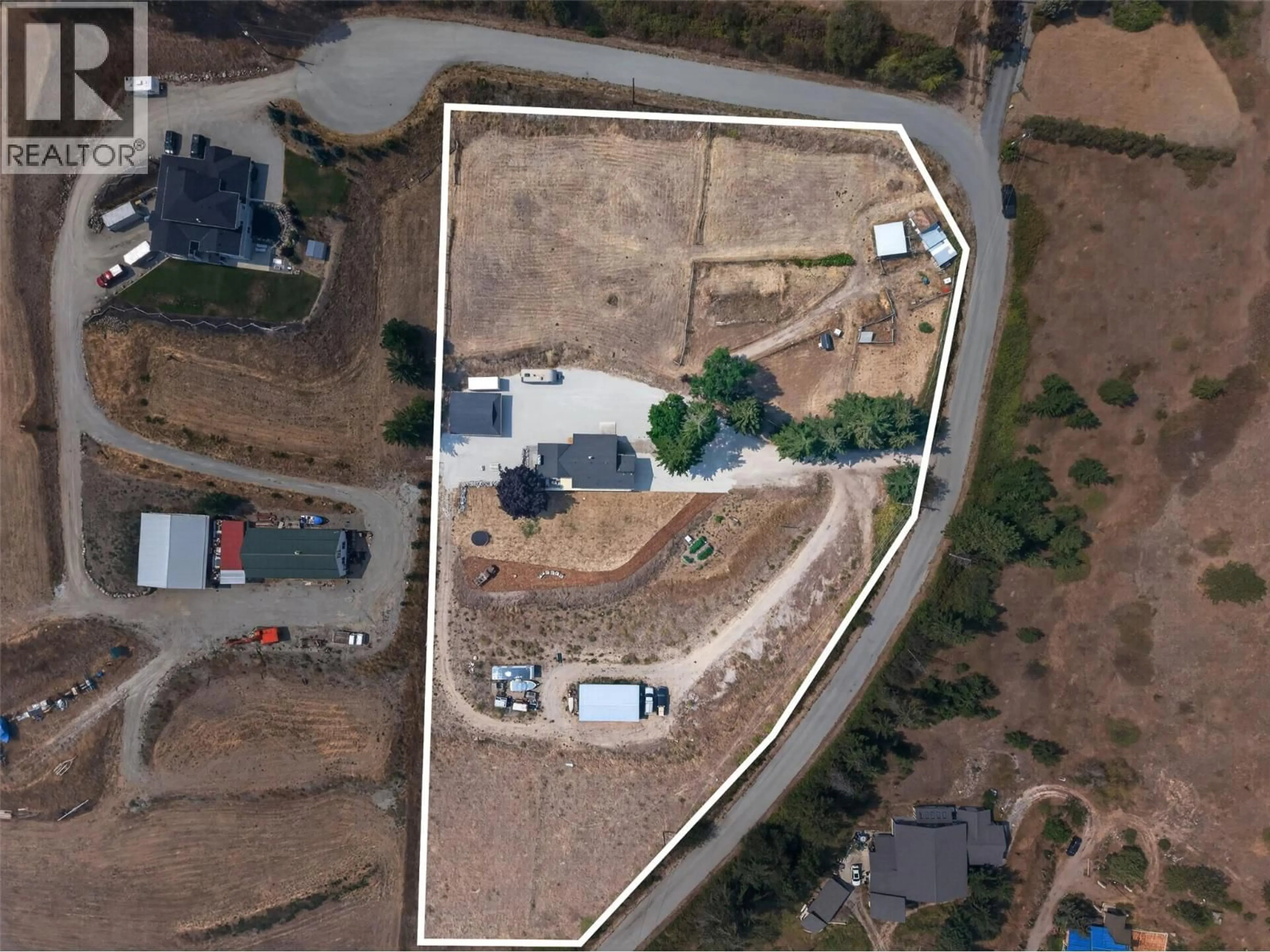A pic from outside/outdoor area/front of a property/back of a property/a pic from drone, building for 3491 FENTON ROAD, West Kelowna British Columbia V4T1V8
