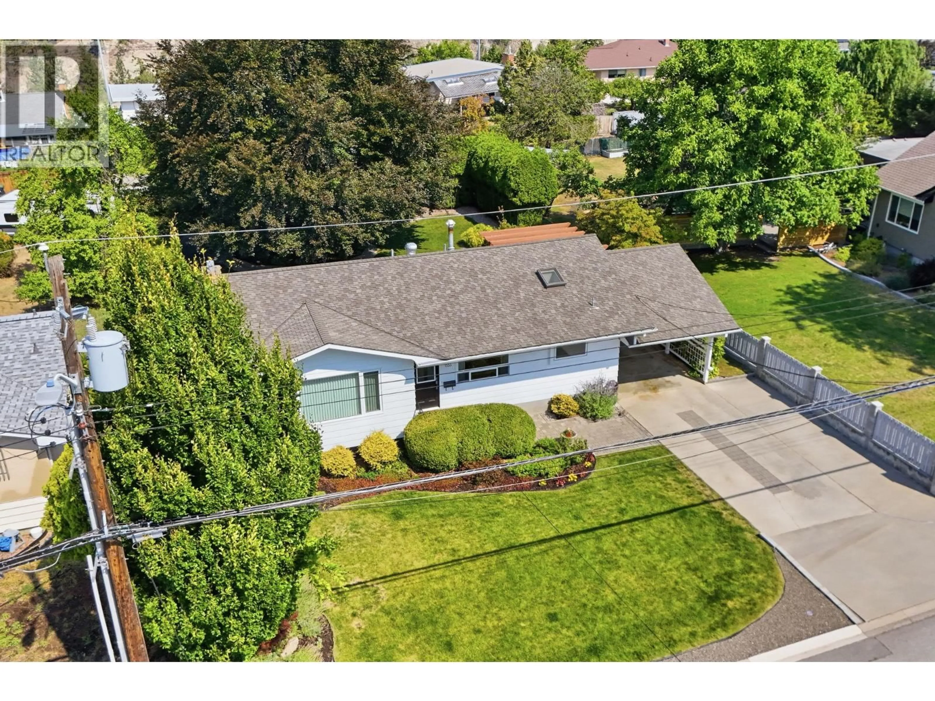 A pic from outside/outdoor area/front of a property/back of a property/a pic from drone, street for 1555 DUNCAN AVENUE EAST, Penticton British Columbia V2A2X7