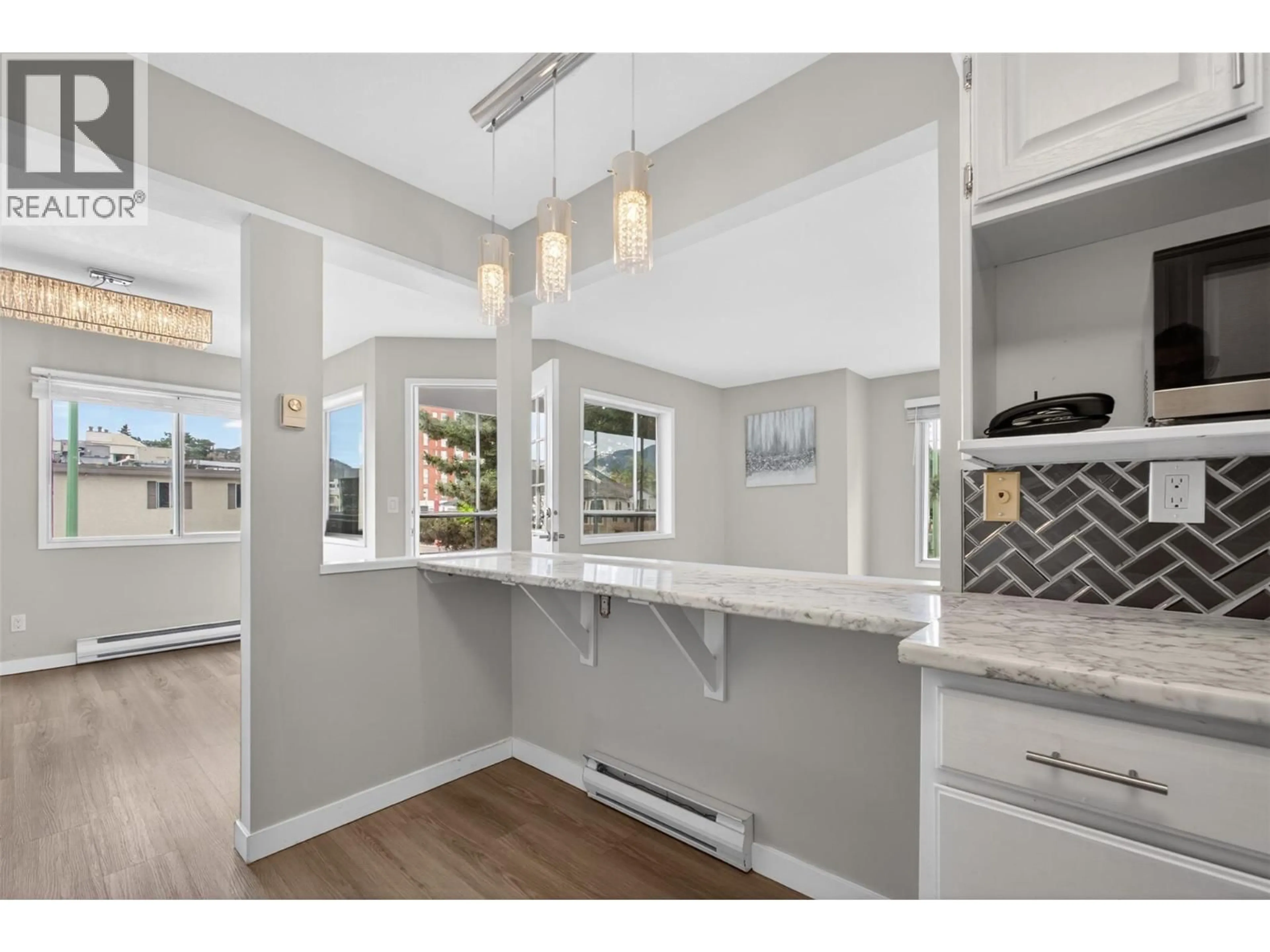 Open concept kitchen, unknown for 101 - 1610 GORDON DRIVE, Kelowna British Columbia V1Y3G9