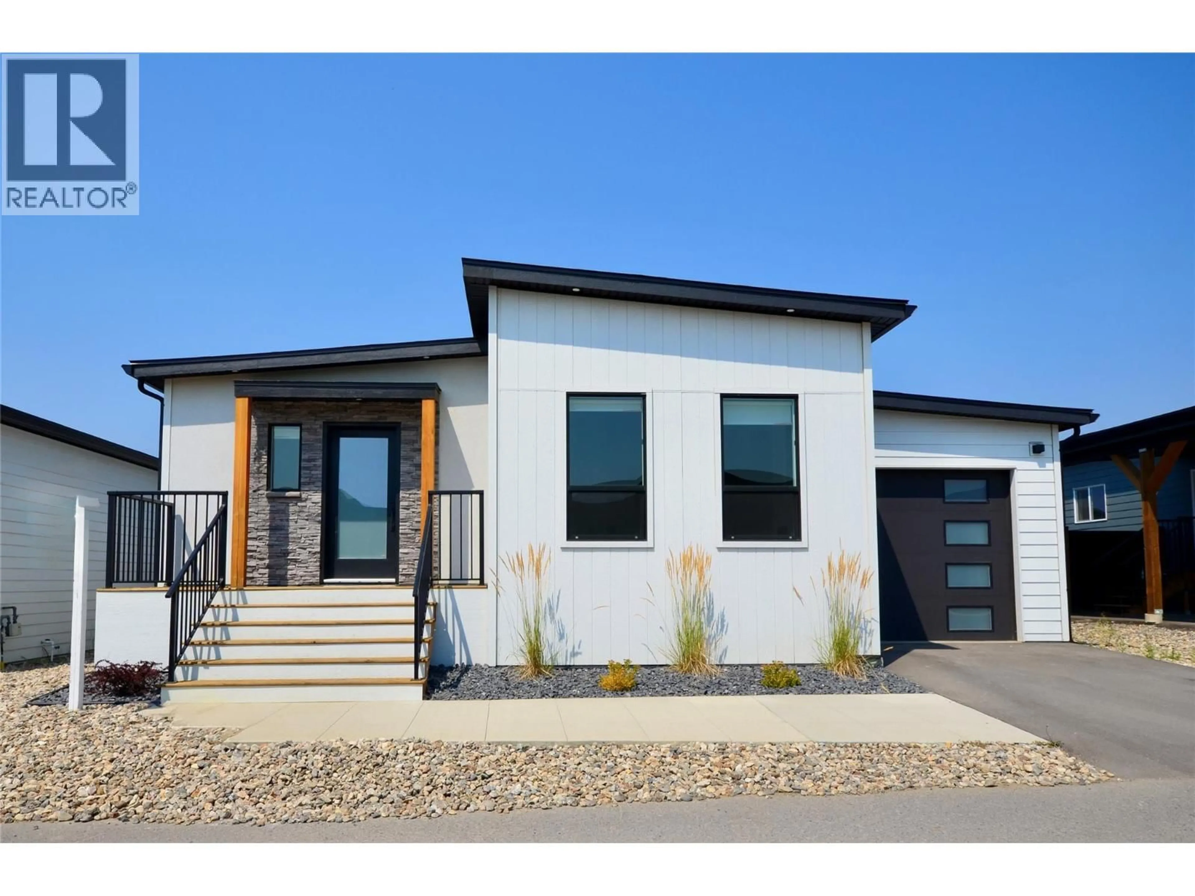 Home with vinyl exterior material, street for 126 - 8900 JIM BAILEY ROAD, Kelowna British Columbia V1H2A4