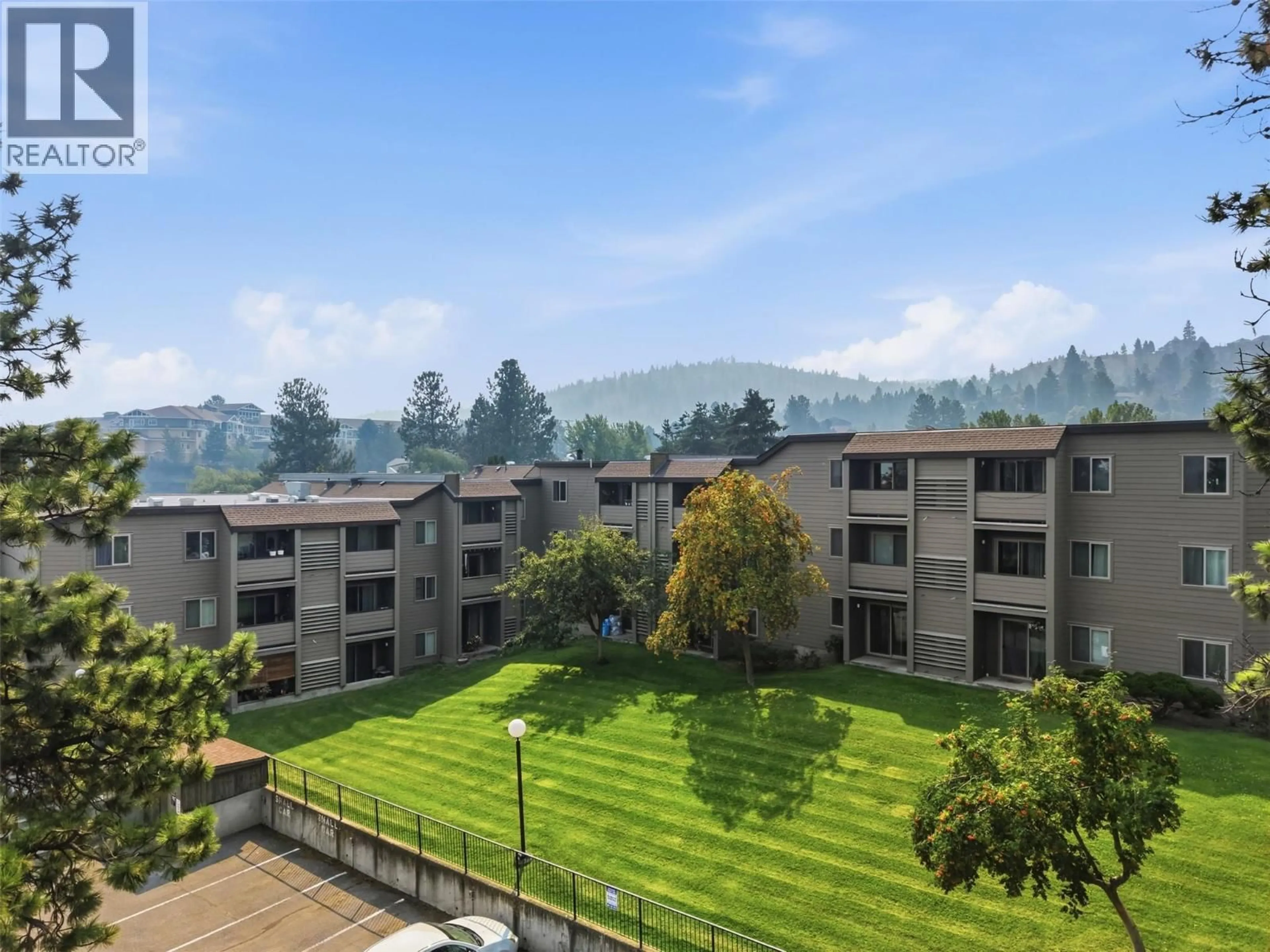 A pic from outside/outdoor area/front of a property/back of a property/a pic from drone, mountain view for 348 - 1560 SUMMIT DRIVE, Kamloops British Columbia V2E1R5