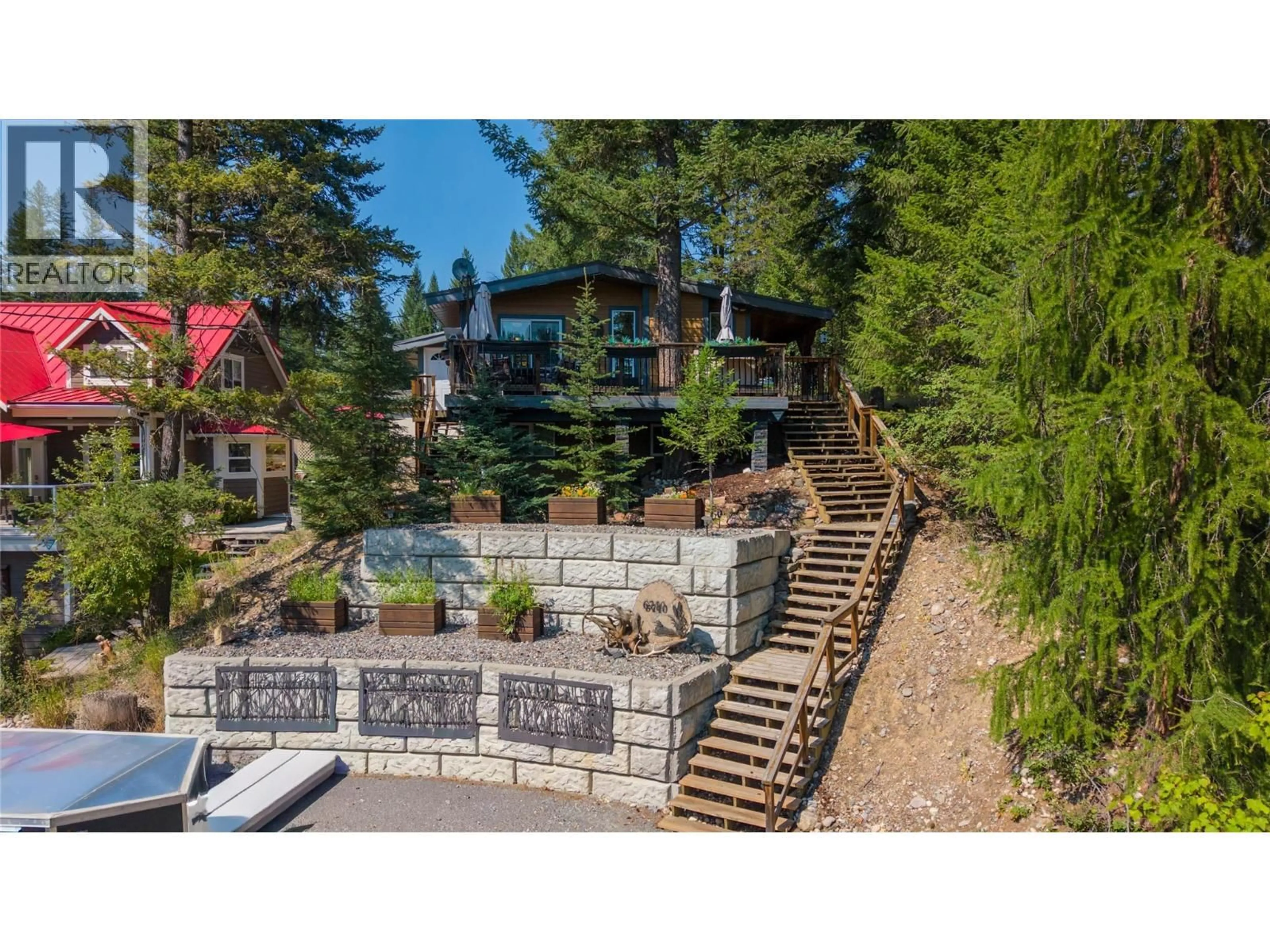 A pic from outside/outdoor area/front of a property/back of a property/a pic from drone, mountain view for 6740 ROSEN LAKE ROAD, Jaffray British Columbia V0B1T0