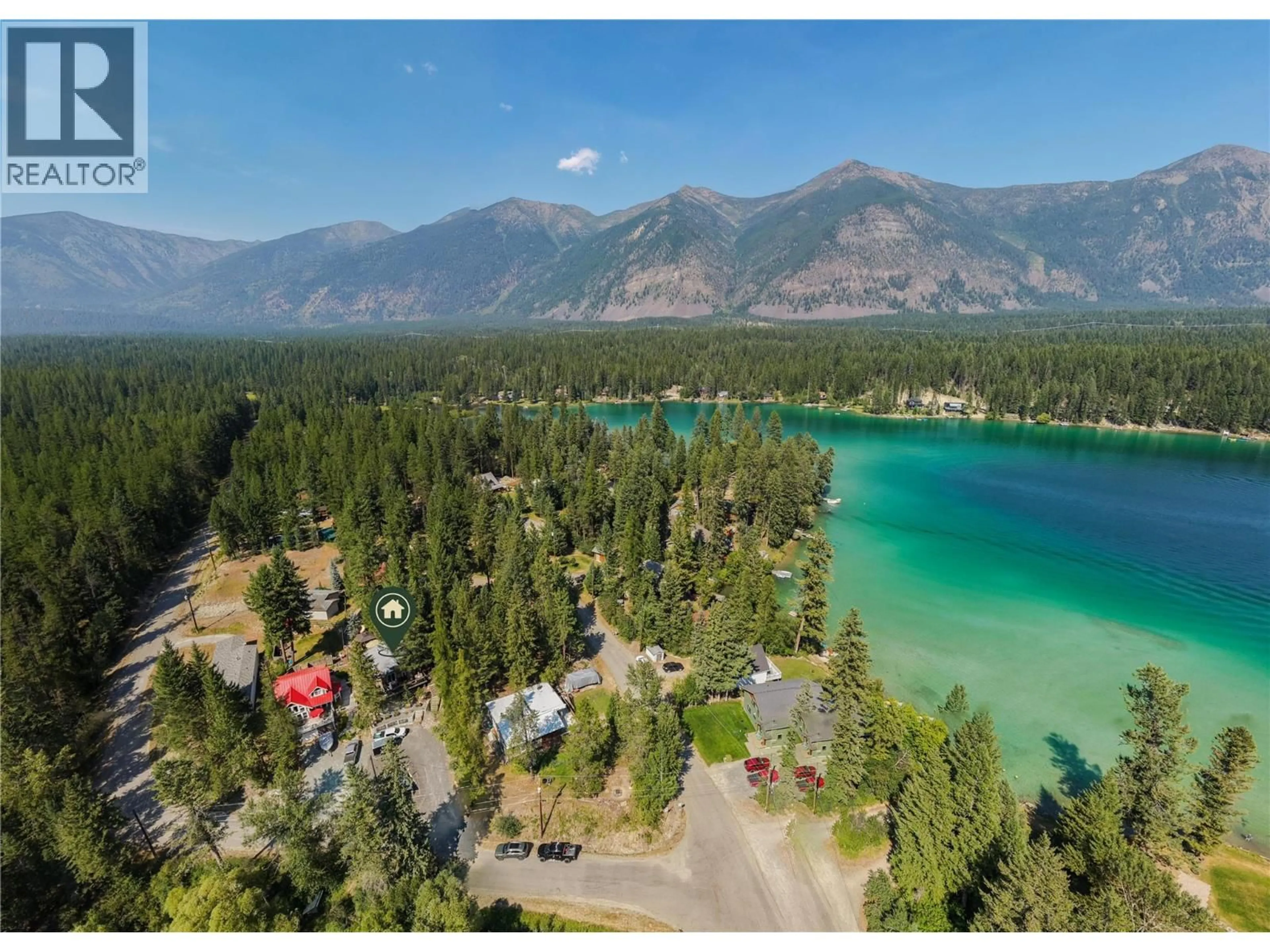 A pic from outside/outdoor area/front of a property/back of a property/a pic from drone, mountain view for 6740 ROSEN LAKE ROAD, Jaffray British Columbia V0B1T0