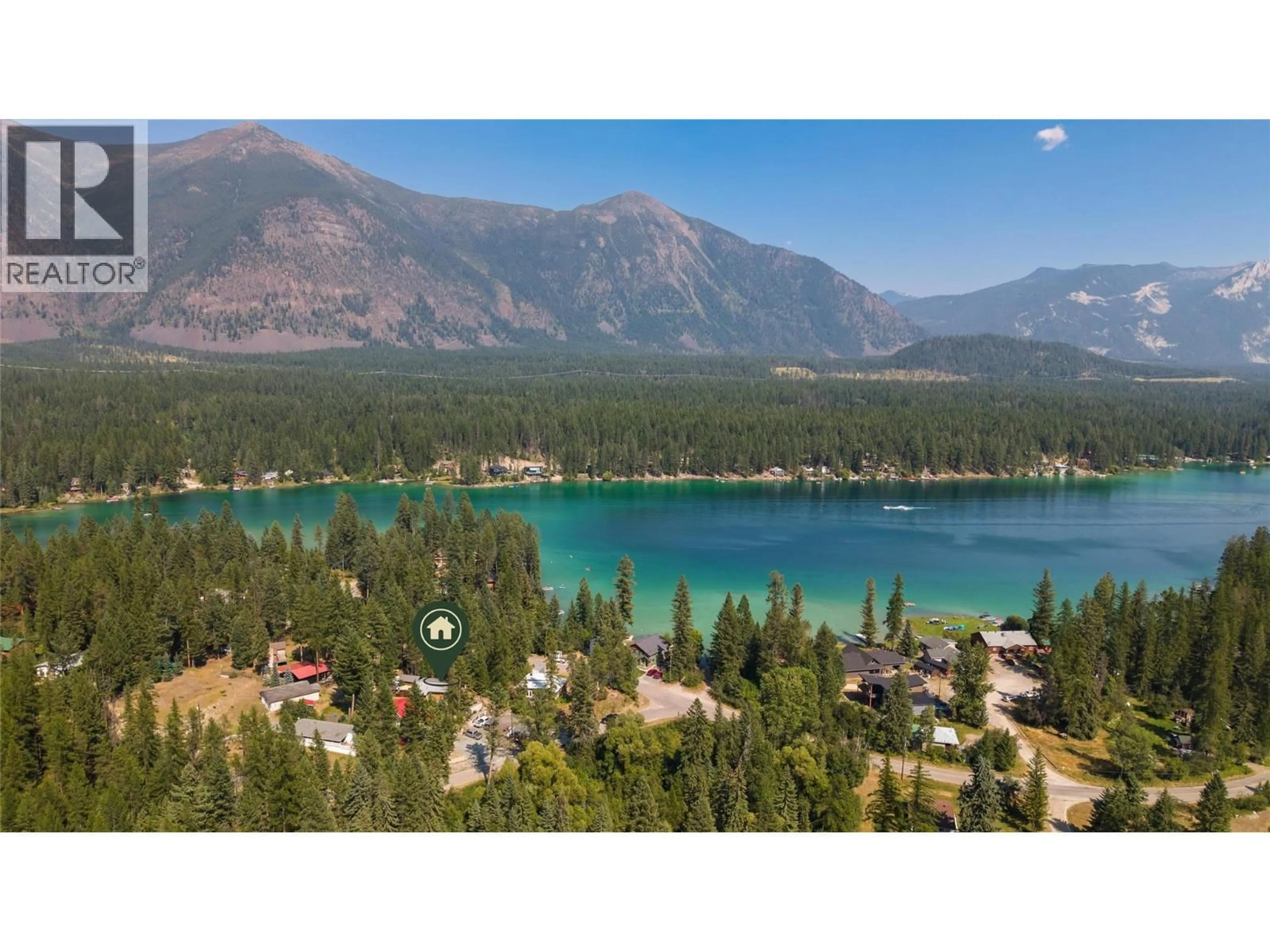 A pic from outside/outdoor area/front of a property/back of a property/a pic from drone, water/lake/river/ocean view for 6740 ROSEN LAKE ROAD, Jaffray British Columbia V0B1T0