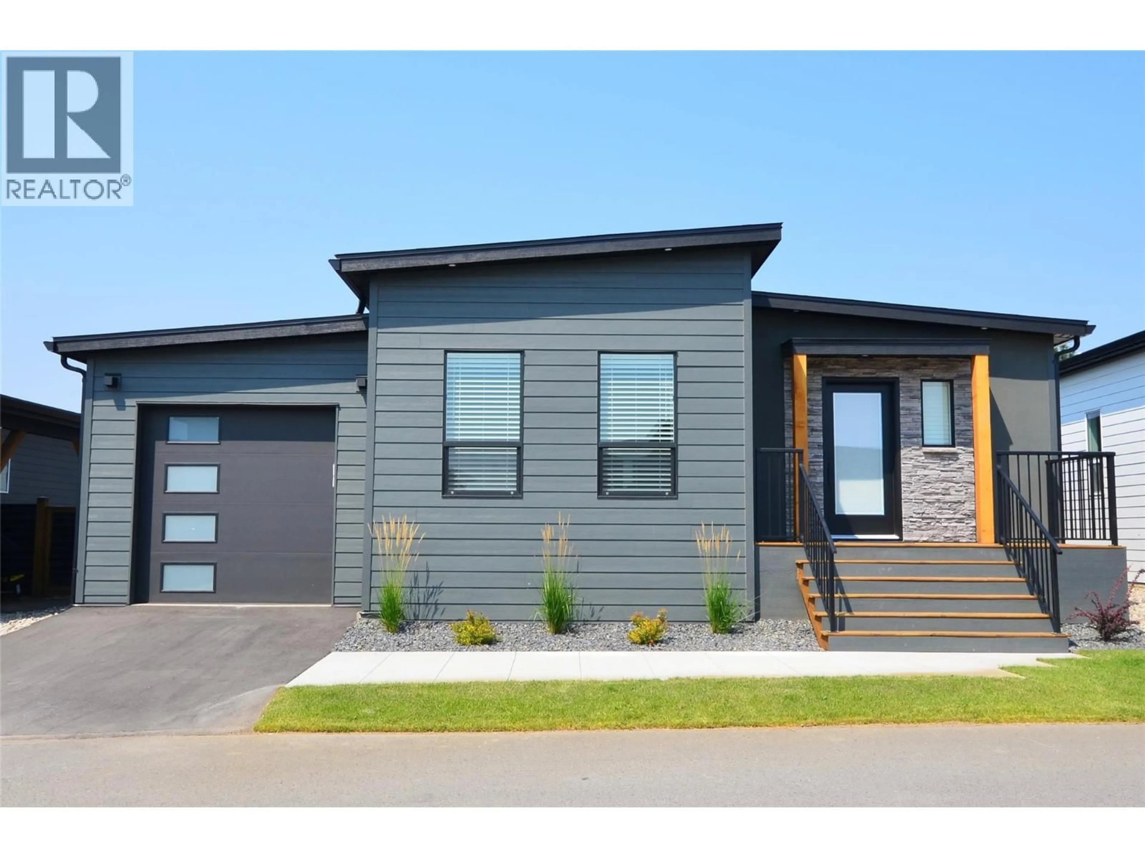 Home with vinyl exterior material, street for 115 - 8900 JIM BAILEY ROAD, Kelowna British Columbia V4V1E5