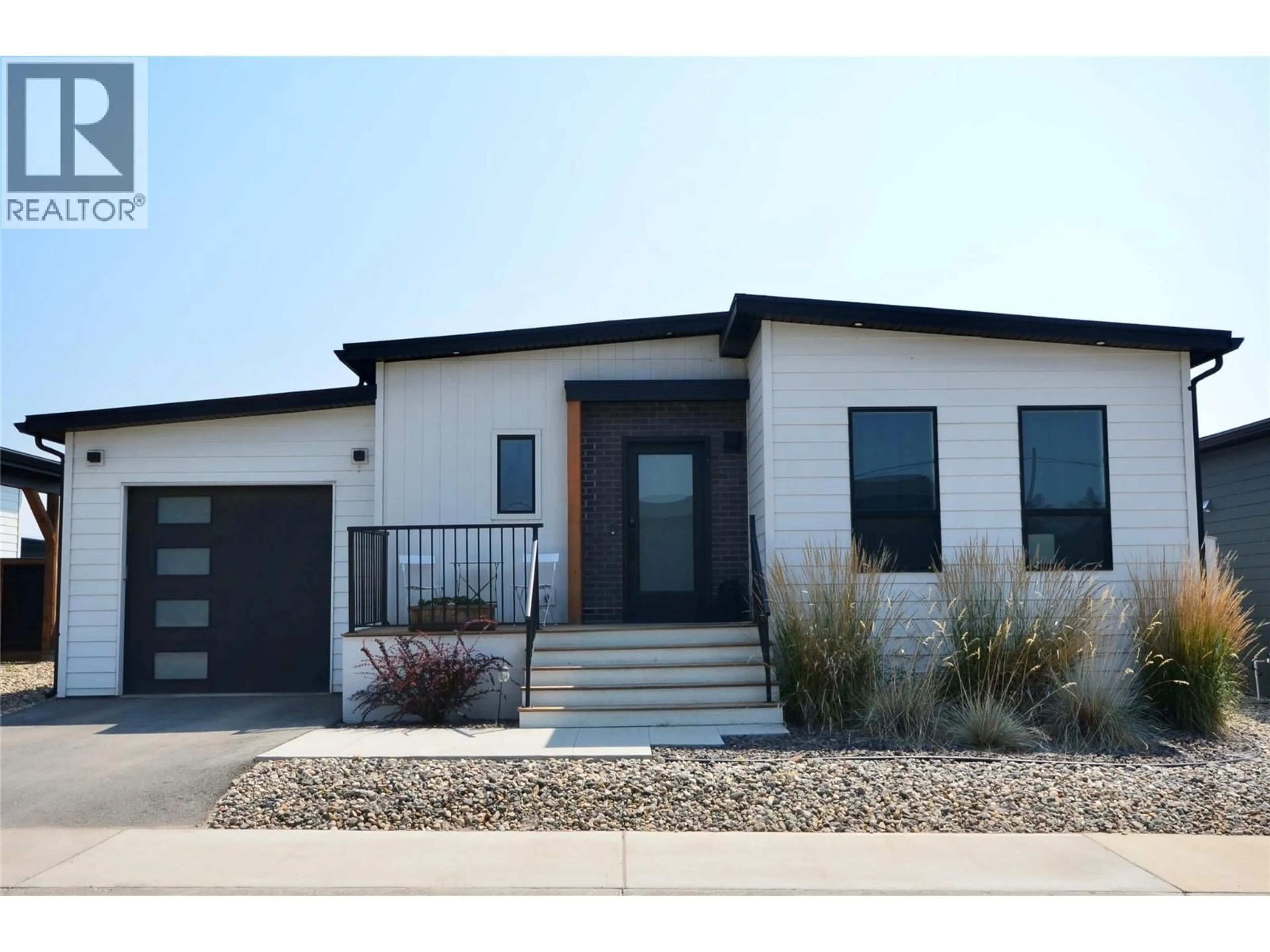 Home with vinyl exterior material, street for 112 - 8900 JIM BAILEY ROAD, Kelowna British Columbia V4V1E5