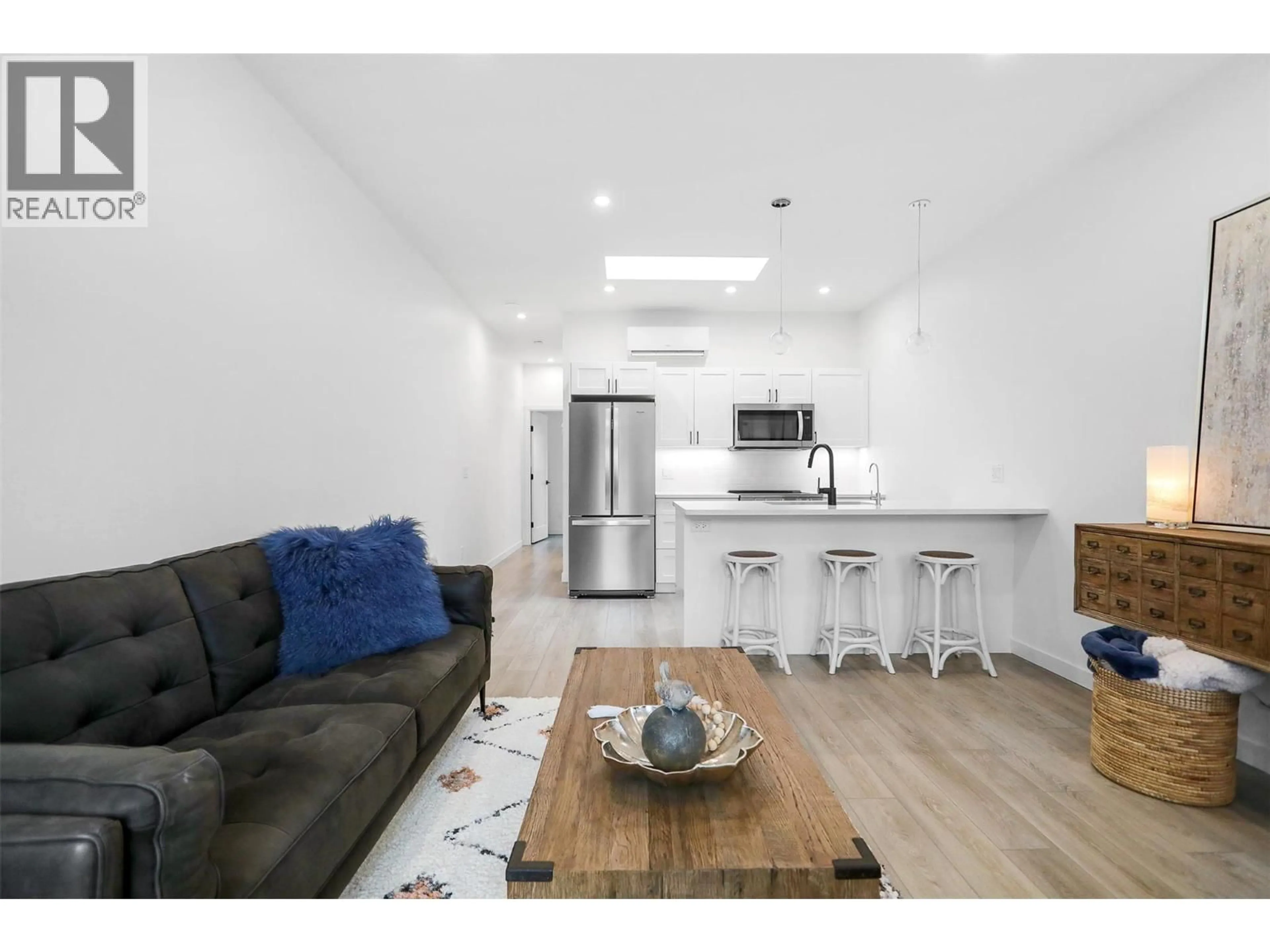 Open concept kitchen, wood/laminate floor for 188D - 8900 JIM BAILEY ROAD, Kelowna British Columbia V4V1E5