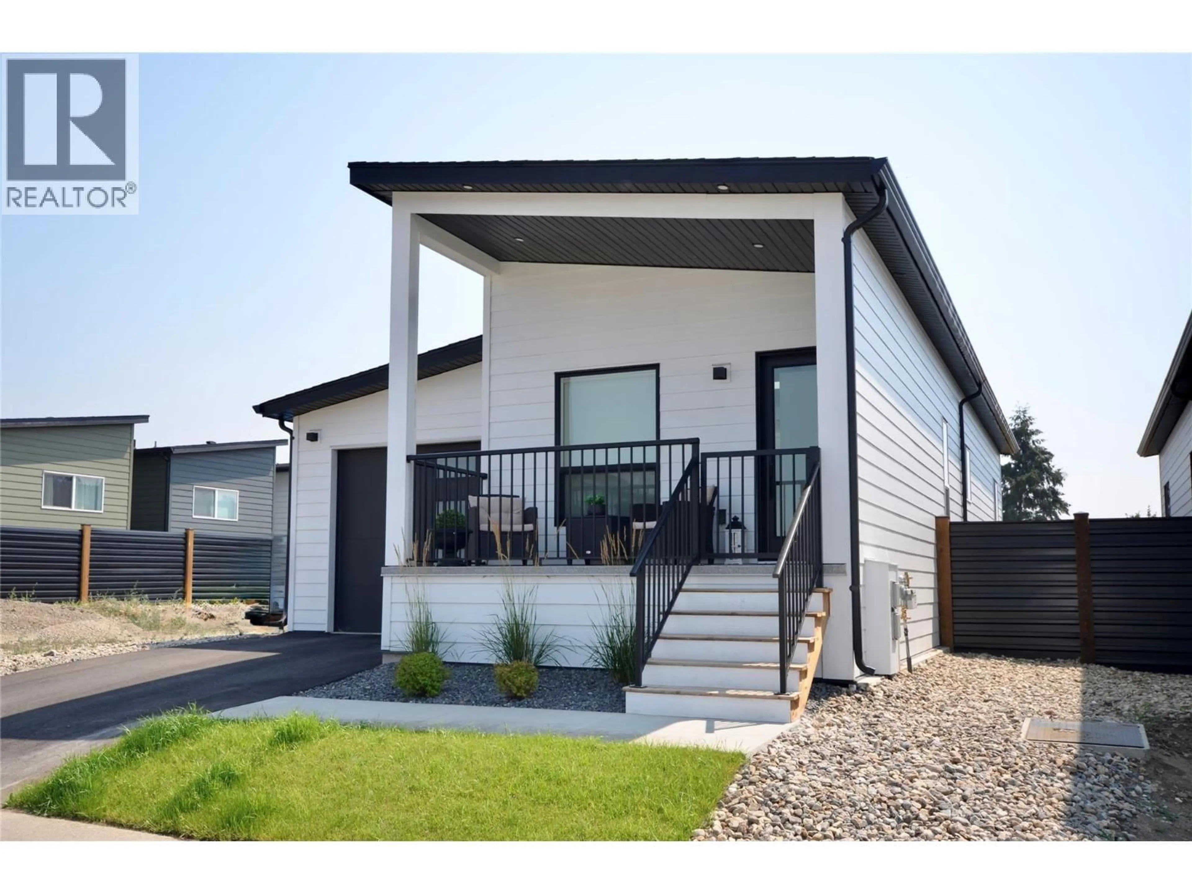 Home with vinyl exterior material, street for 167 - 8900 JIM BAILEY ROAD, Kelowna British Columbia V4V1E5