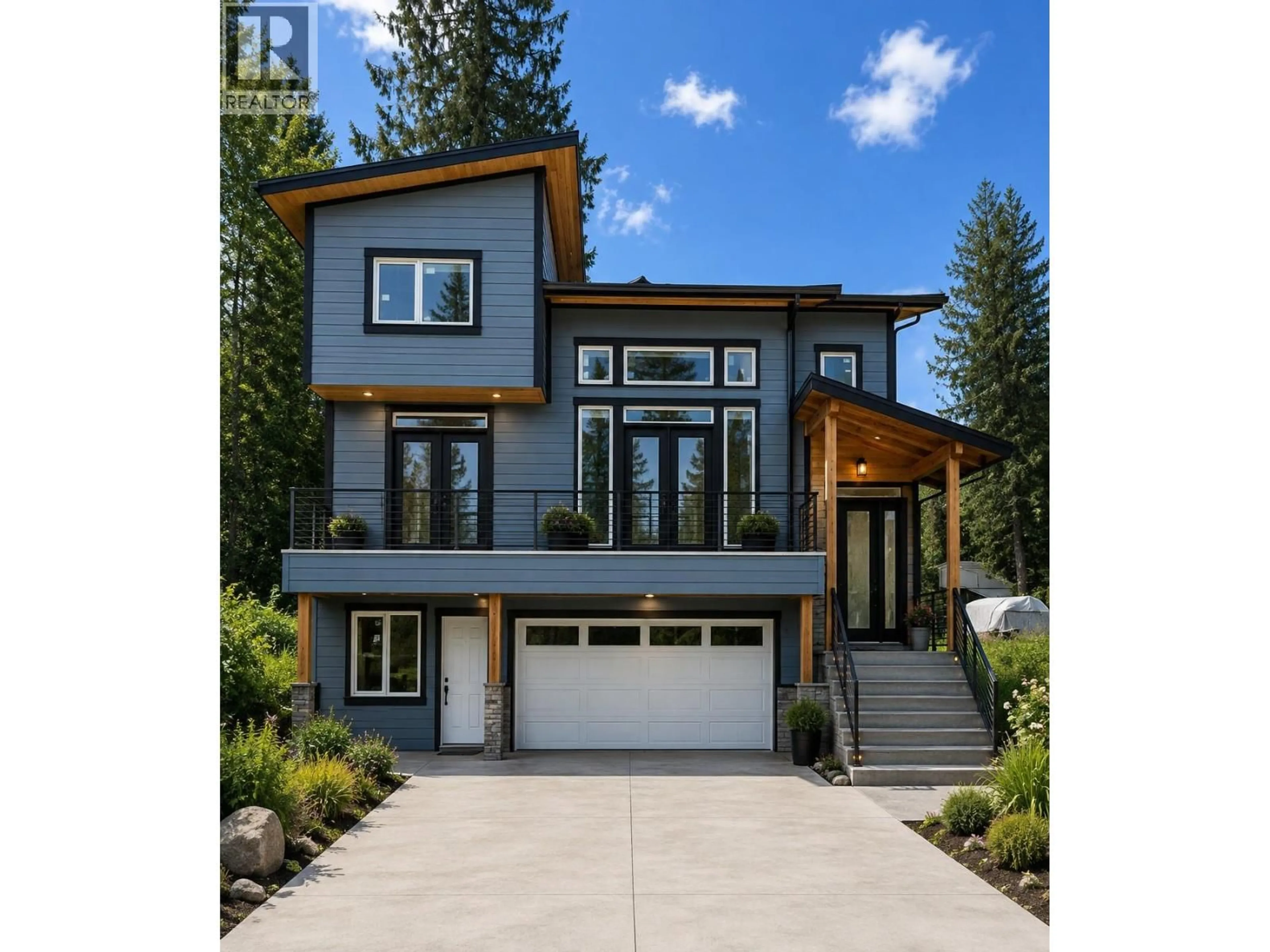 Home with vinyl exterior material, street for 1695 ARROW DRIVE, Revelstoke British Columbia V0E2S1