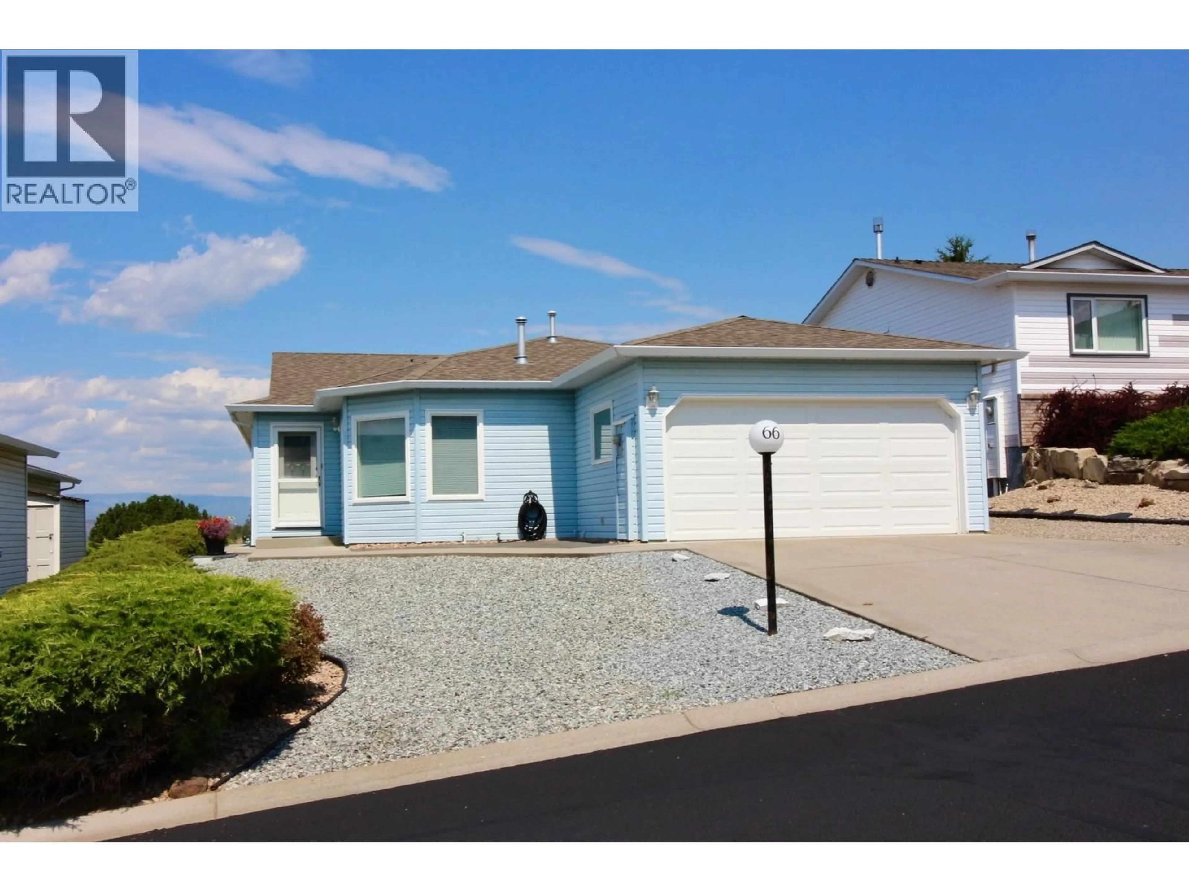 Home with vinyl exterior material, street for 66 - 6400 SPENCER ROAD, Kelowna British Columbia V1X7T6