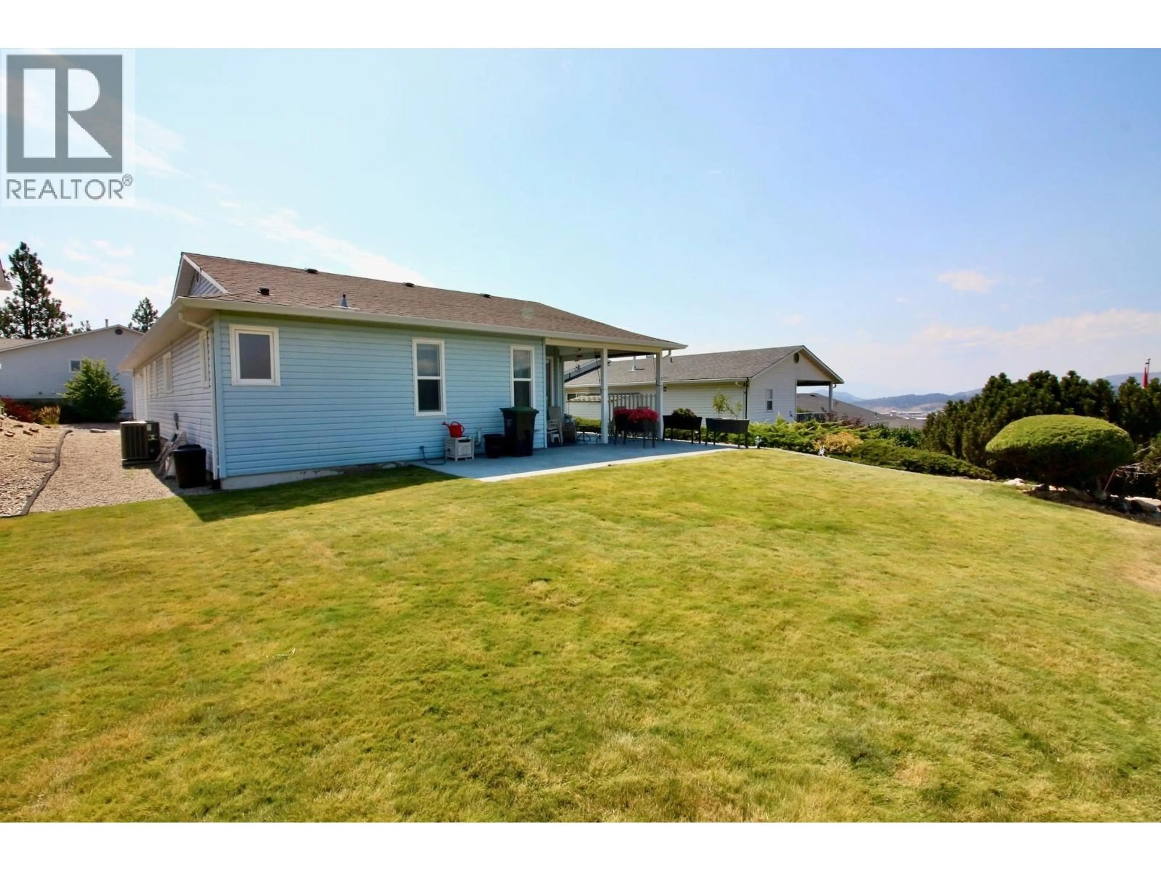 A pic from outside/outdoor area/front of a property/back of a property/a pic from drone, water/lake/river/ocean view for 66 - 6400 SPENCER ROAD, Kelowna British Columbia V1X7T6