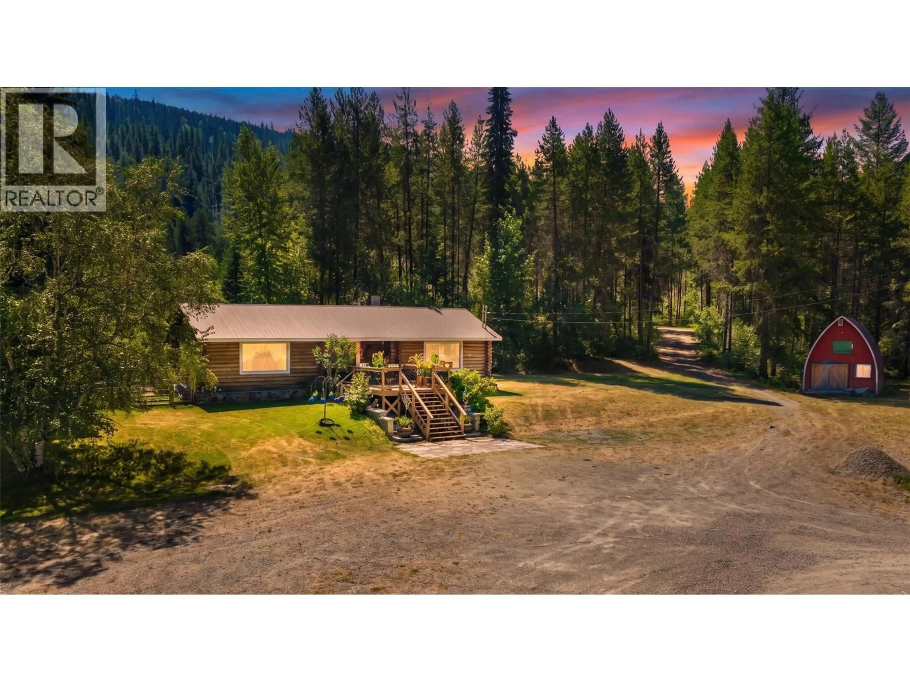 A pic from outside/outdoor area/front of a property/back of a property/a pic from drone, mountain view for 9889 HIGHWAY 3/95 OTHER, Yahk British Columbia V0B2P0