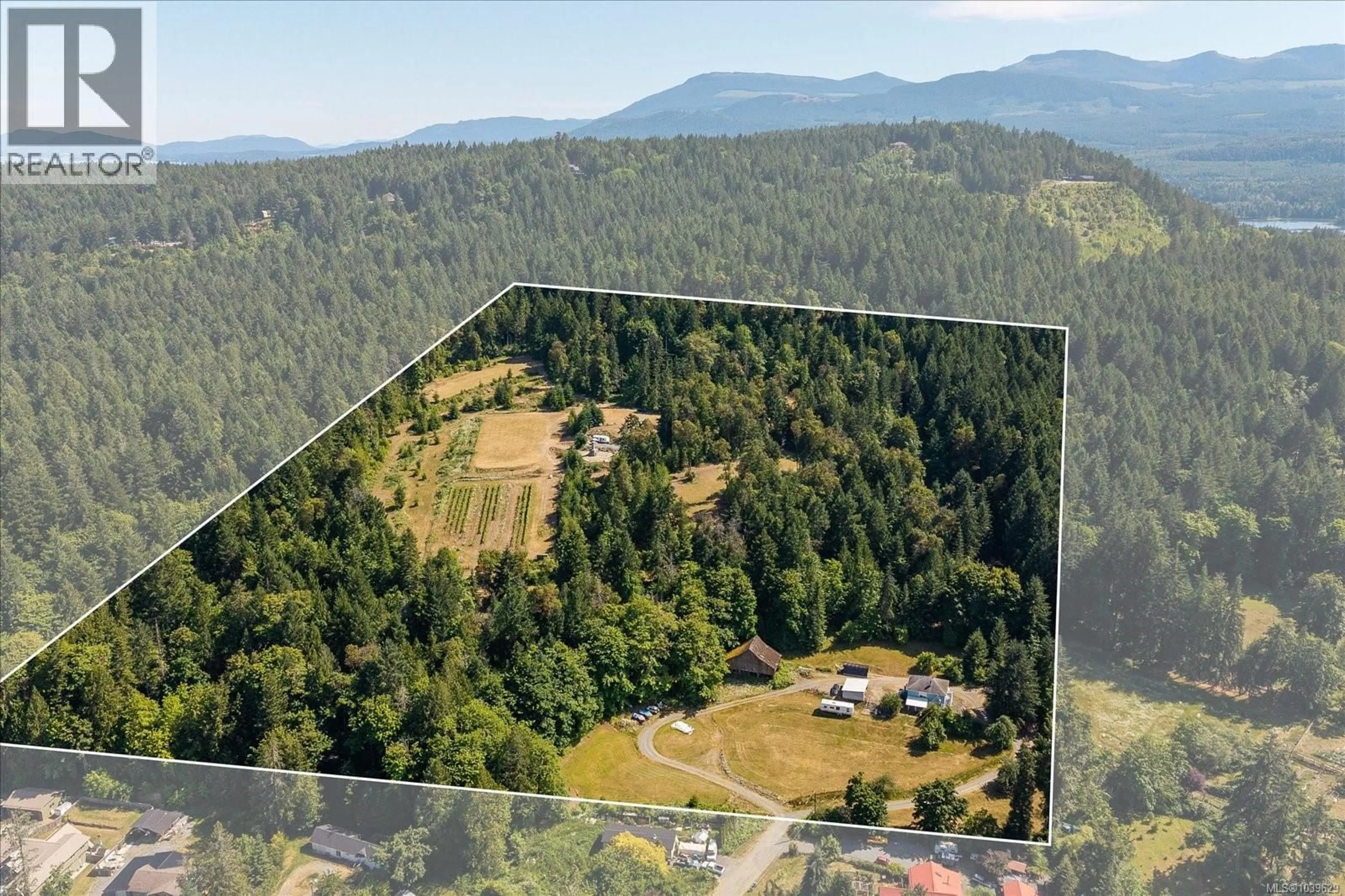 A pic from outside/outdoor area/front of a property/back of a property/a pic from drone, forest/trees view for 13520 ROUNDUP DRIVE, Ladysmith British Columbia V9G1H4