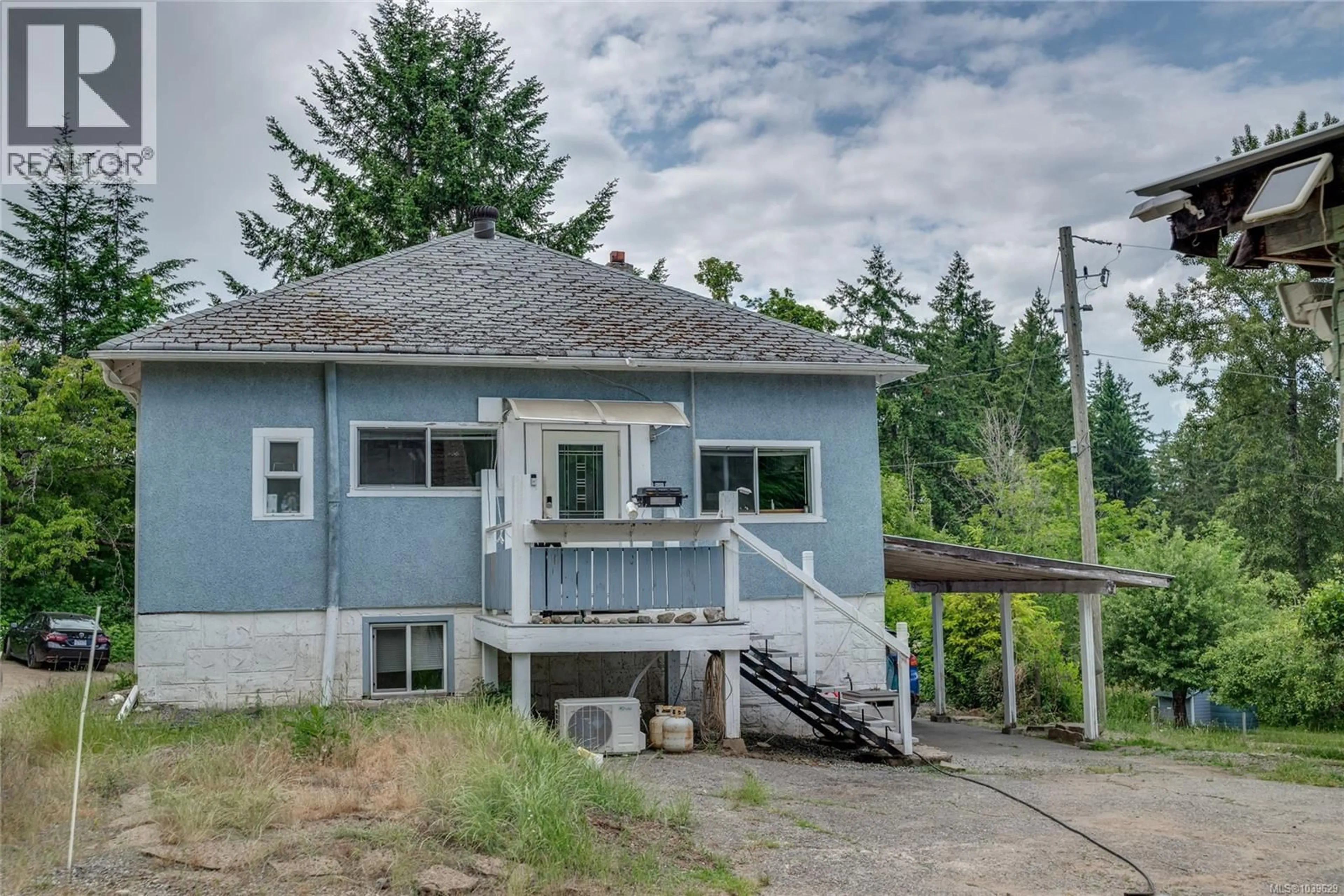 A pic from outside/outdoor area/front of a property/back of a property/a pic from drone, street for 13520 ROUNDUP DRIVE, Ladysmith British Columbia V9G1H4