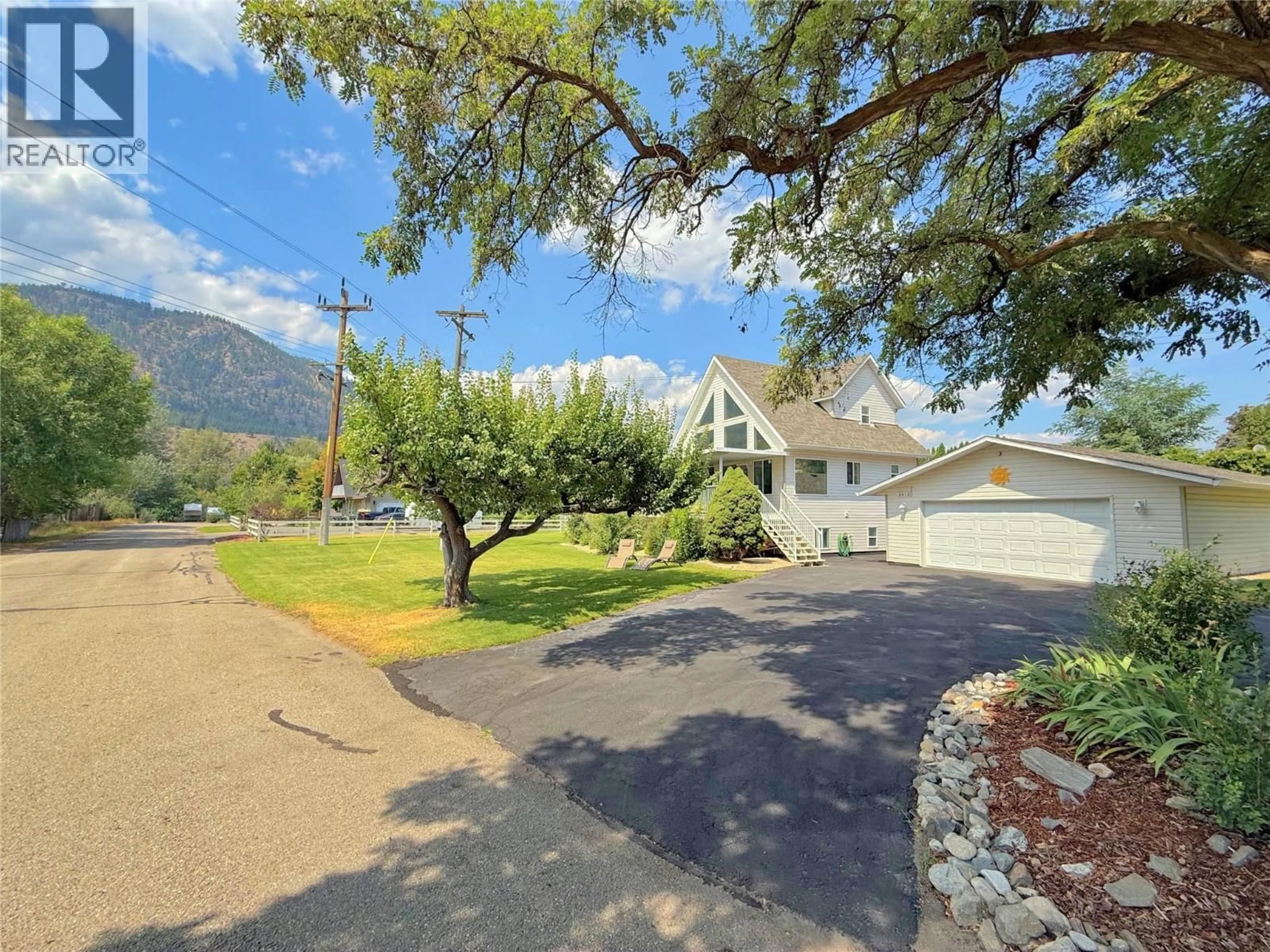 A pic from outside/outdoor area/front of a property/back of a property/a pic from drone, mountain view for 5012 14TH AVENUE, Okanagan Falls British Columbia V0H1R0