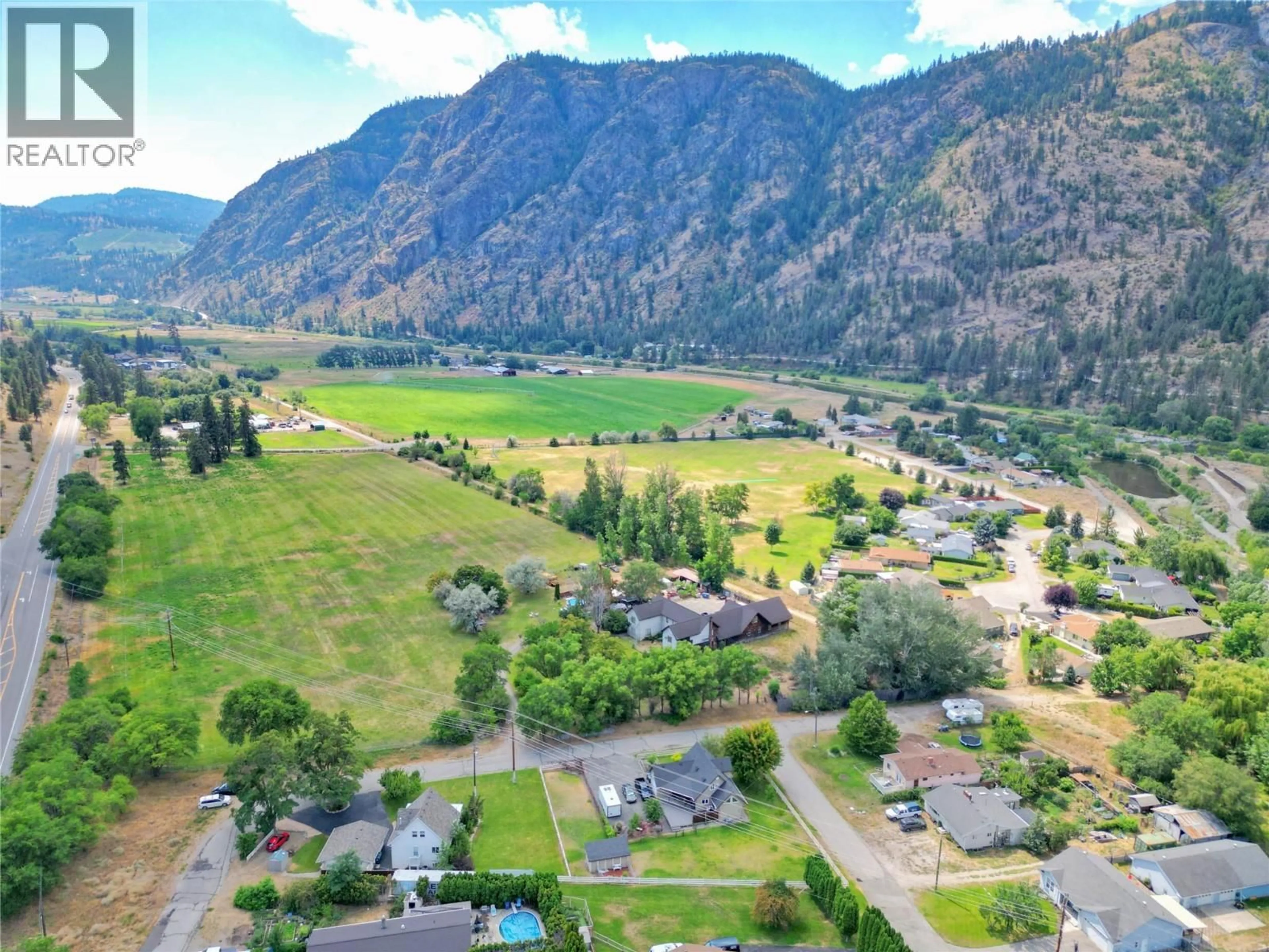 A pic from outside/outdoor area/front of a property/back of a property/a pic from drone, mountain view for 5012 14TH AVENUE, Okanagan Falls British Columbia V0H1R0