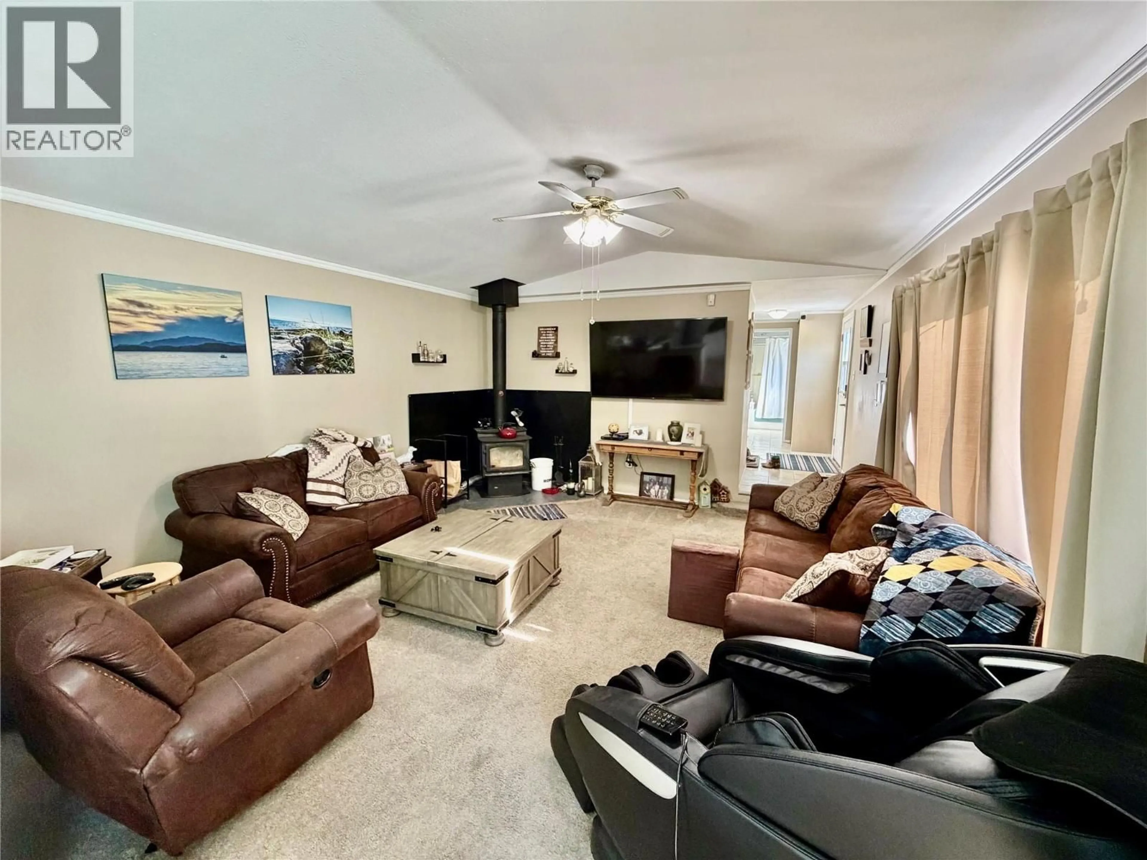 Living room with furniture, unknown for 13239 MCKINNON WAY, Dawson Creek British Columbia V1G0C2